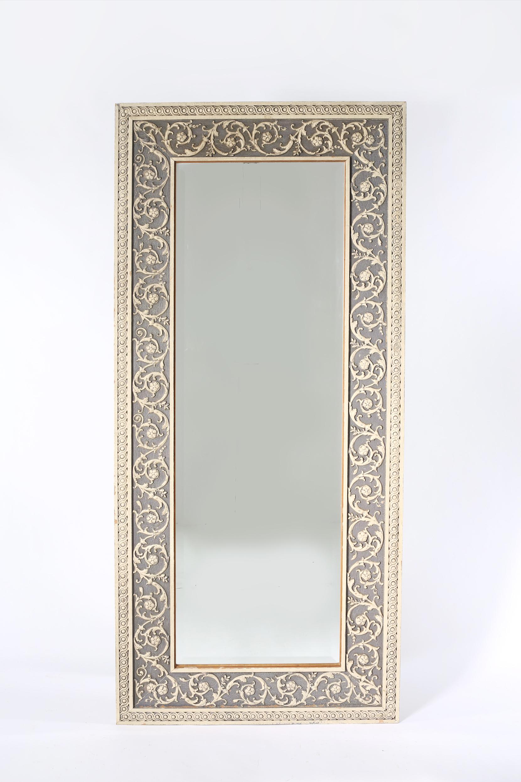 20th century wood framed floor length / hanging wall mirror. The mirror in in good condition with minor wear consistent with age / use. The mirror stand about 79 inches high x 36 inches wide x 2 inches deep.