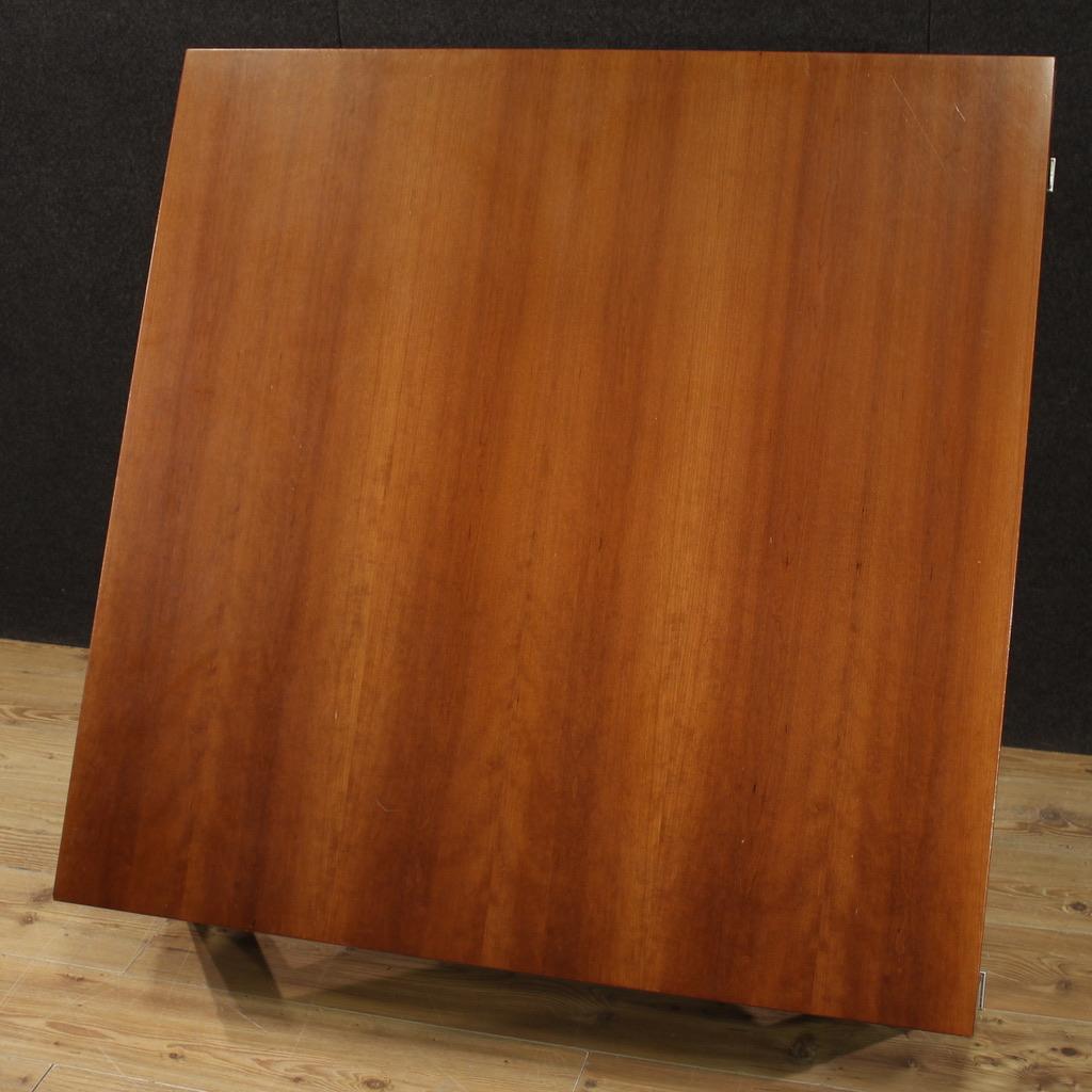 Great Italian coffee table from the 1980s. Cherry veneered design furniture of exceptional size and great service. Coffee table supported by four solid legs with silver metal decorations (see photo). Ideal furniture to be placed in a large living