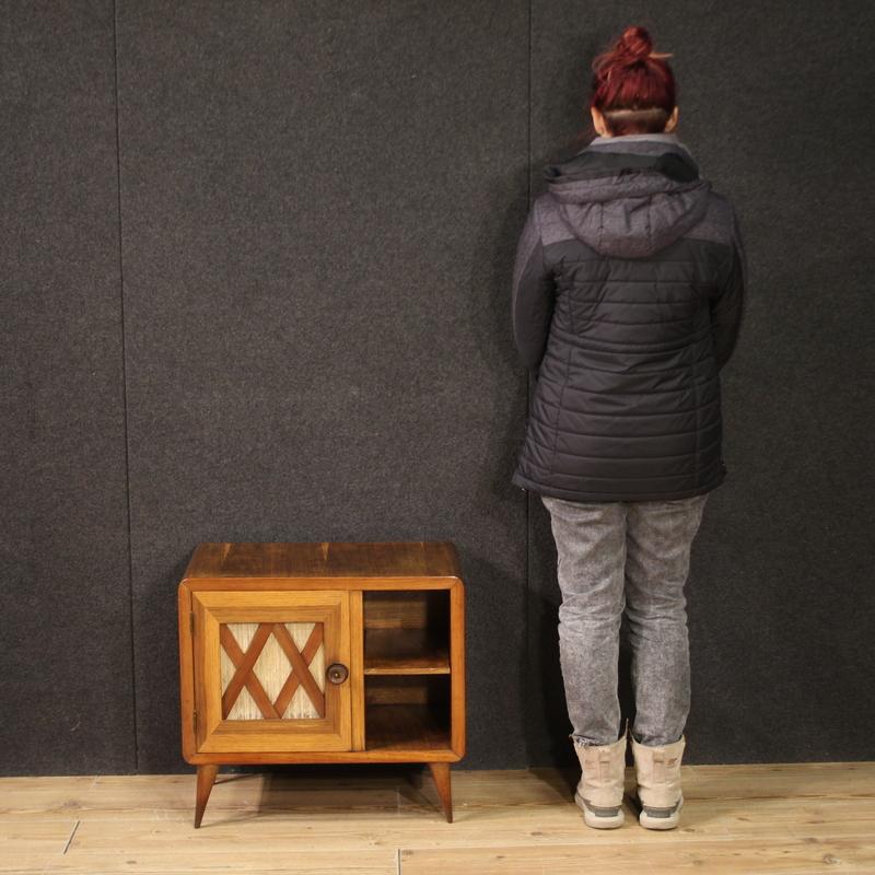 Italian cabinet from the mid-20th century. Gio Ponti style bedside table of excellent quality in poplar wood and fruitwood, of beautiful lines and pleasant furnishings. Night stand with a door with geometric decorations and an open compartment, of