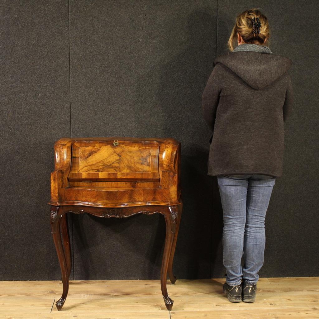 Venetian bureau from the mid-20th century. Furniture finished for the center, carved, veneered, and inlaid in walnut, burl, maple, and beech. This tall-legged bureau, beautifully proportioned and beautifully designed, it can easily be placed