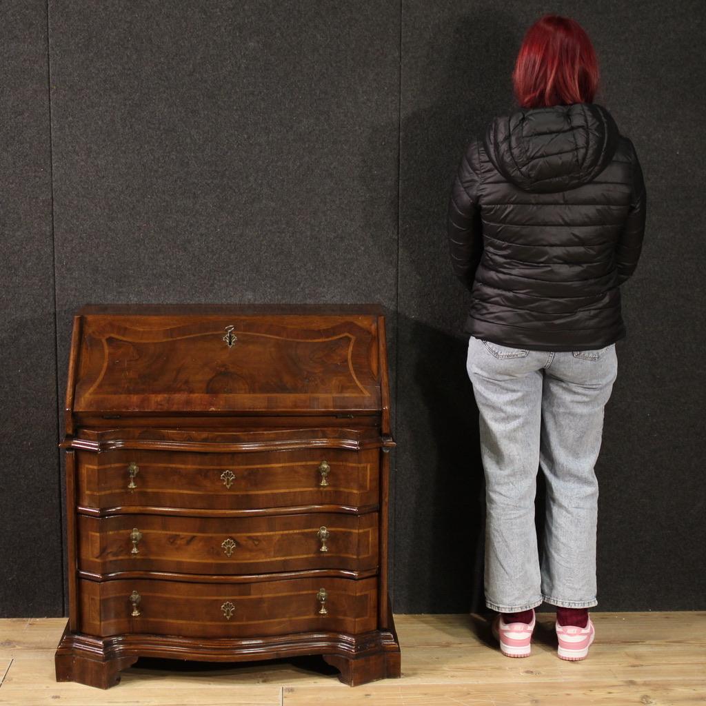 Venetian bureau from the mid-20th century. A beautifully sized and proportioned piece of furniture, carved and veneered in walnut, burl and maple. The bureau has three external drawers of good capacity and a fall-front. The interior offers a wooden