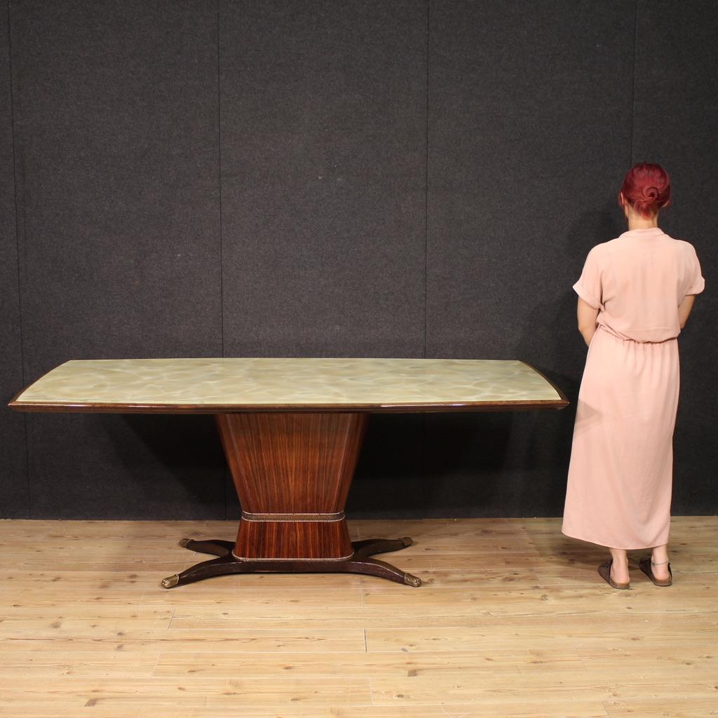 Great Italian dining table from the mid-20th century. Beautifully designed and beautifully furnished, made by Fratelli Rigamonti Desio, Milan, in the 1940s. Excellent size, quality, and service table with the original top with inset marbled glass.