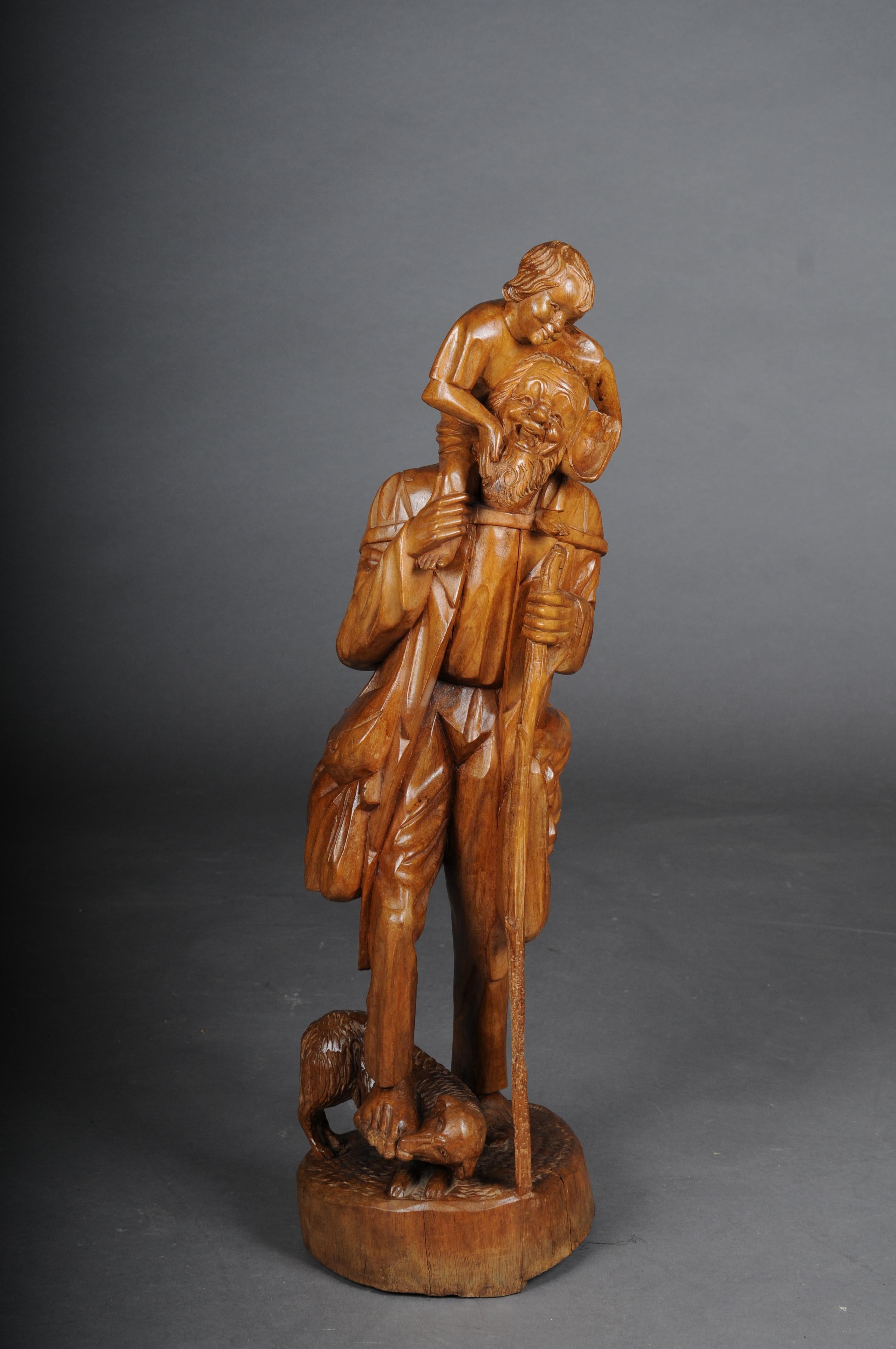 20th Century wooden sculpture as a ranger with child made of lime tree, southern German 20th century.

Solid lime wood. Finely carved figure depicting an old ranger with a child on his shoulders and a dog
Southern Germany/Tyrol 20th century