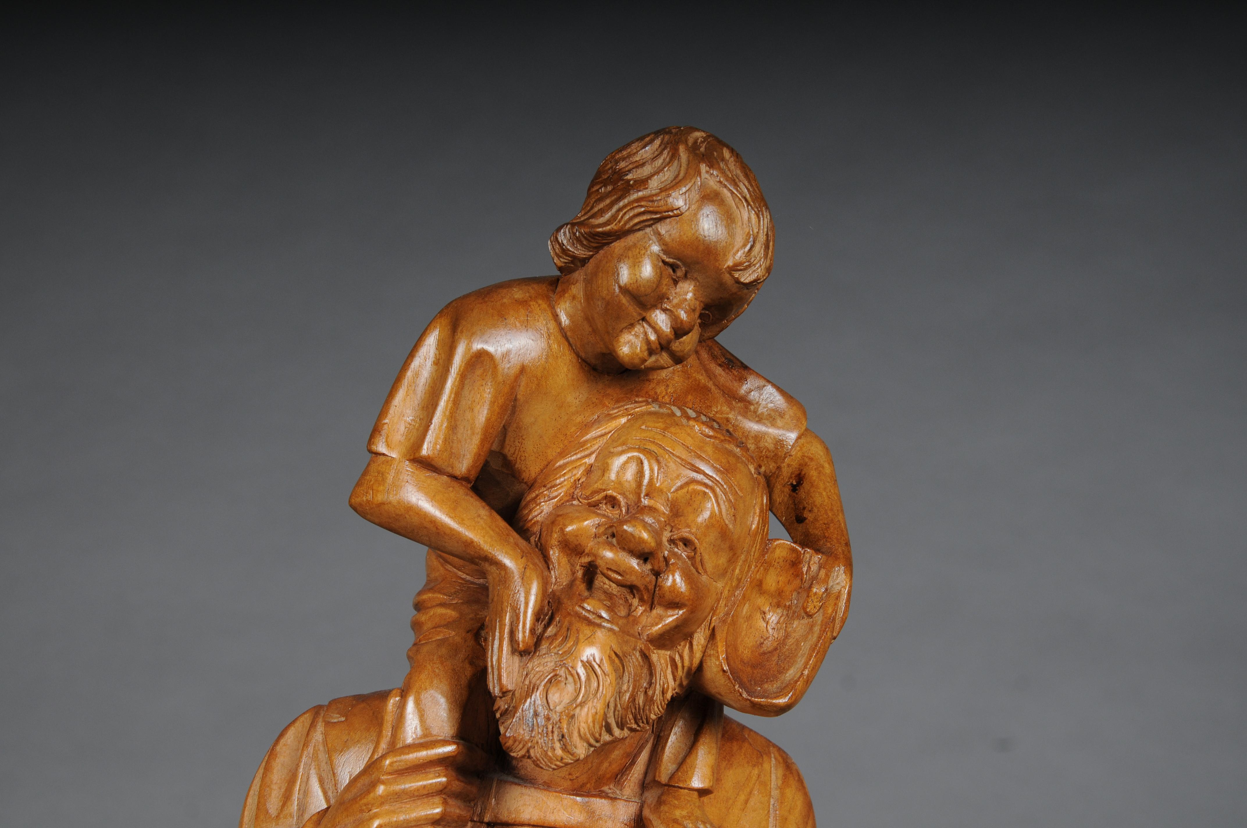 Hand-Carved 20th Century wooden sculpture Ranger with child Lime wood, South German For Sale