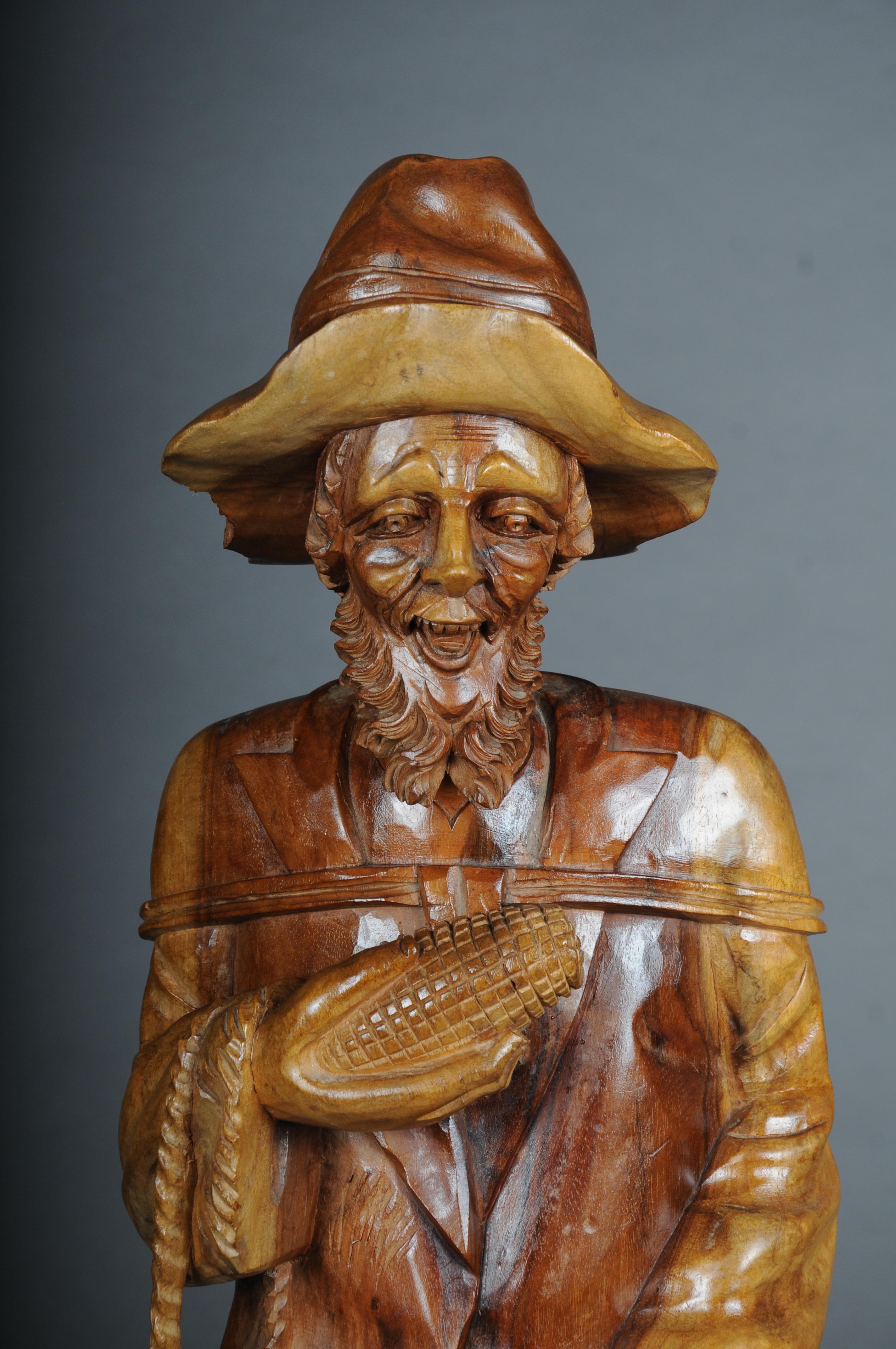 Hand-Carved 20th Century wooden sculpture Walker with corn on the cob, South German For Sale