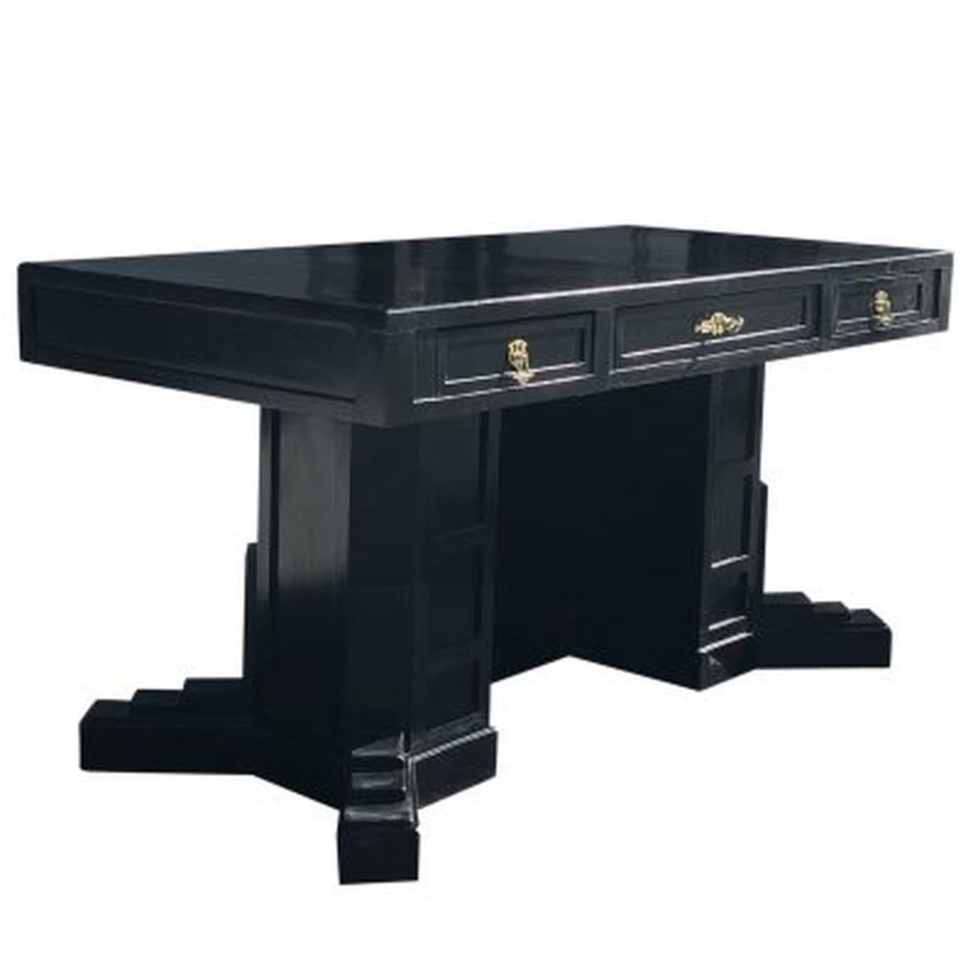 A vintage Art Deco Austrian ebonized freestanding writing desk with three drawers in good condition with its original brass hardware, produced by Wiener Werkstätte. Wear consistent with age and use, circa 1910-1930, Vienna, Austria.

The Wiener