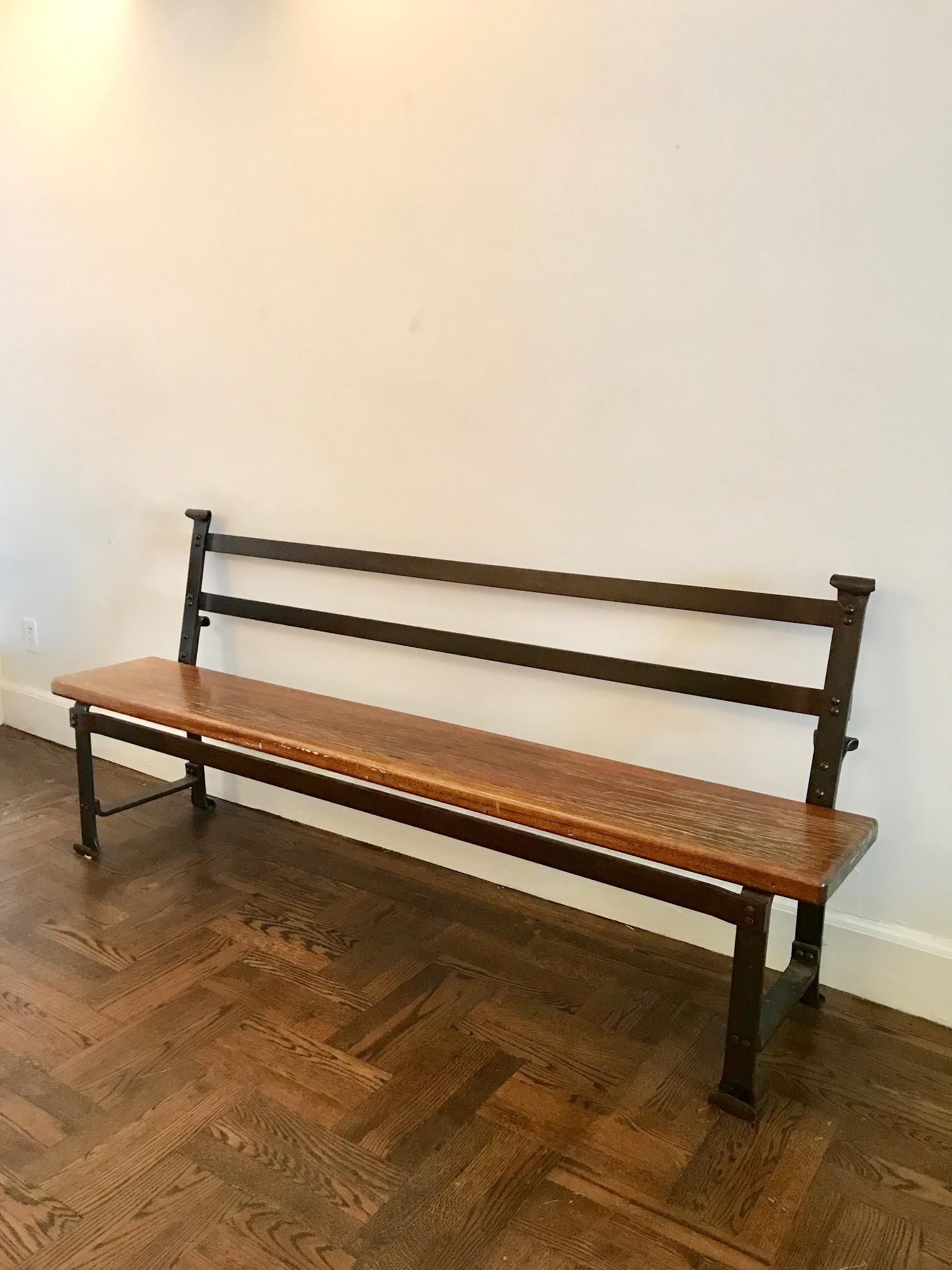 wrought iron and wood benches