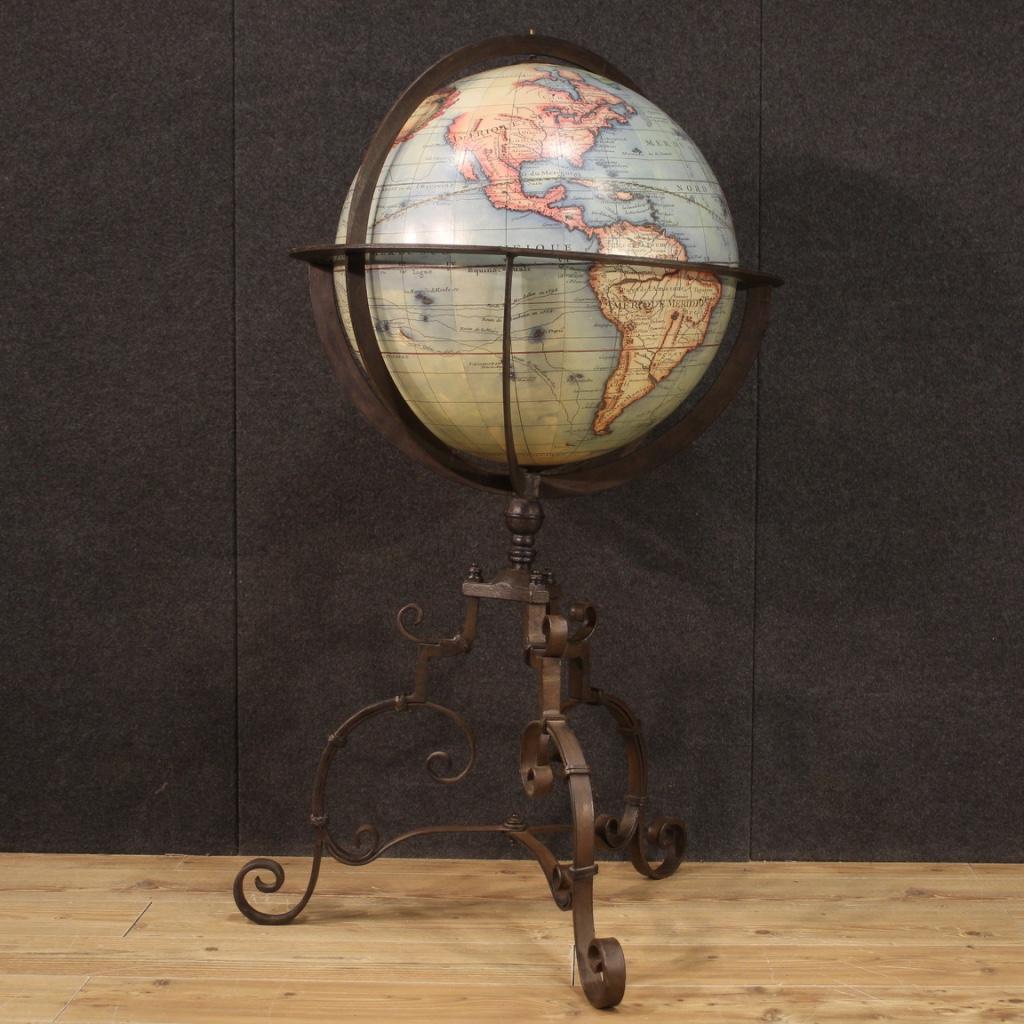 Large Italian globe of the 20th century. Furniture with wrought and forged iron structure with printed terrestrial globe covered in paper depicted in antique style. Globe of great size and impact for antique dealers and interior decorators, ideal to