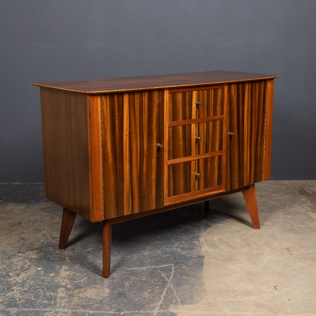 Stylish mid-20th century unusual 'Zebra wood' two door, three drawer sideboard from the Morris of Glasgow, designed by Neil Morris and is from the Cambrae Range, which won awards at the 1950 Ideal Home Exhibition. Veneered in a beautiful and unusual