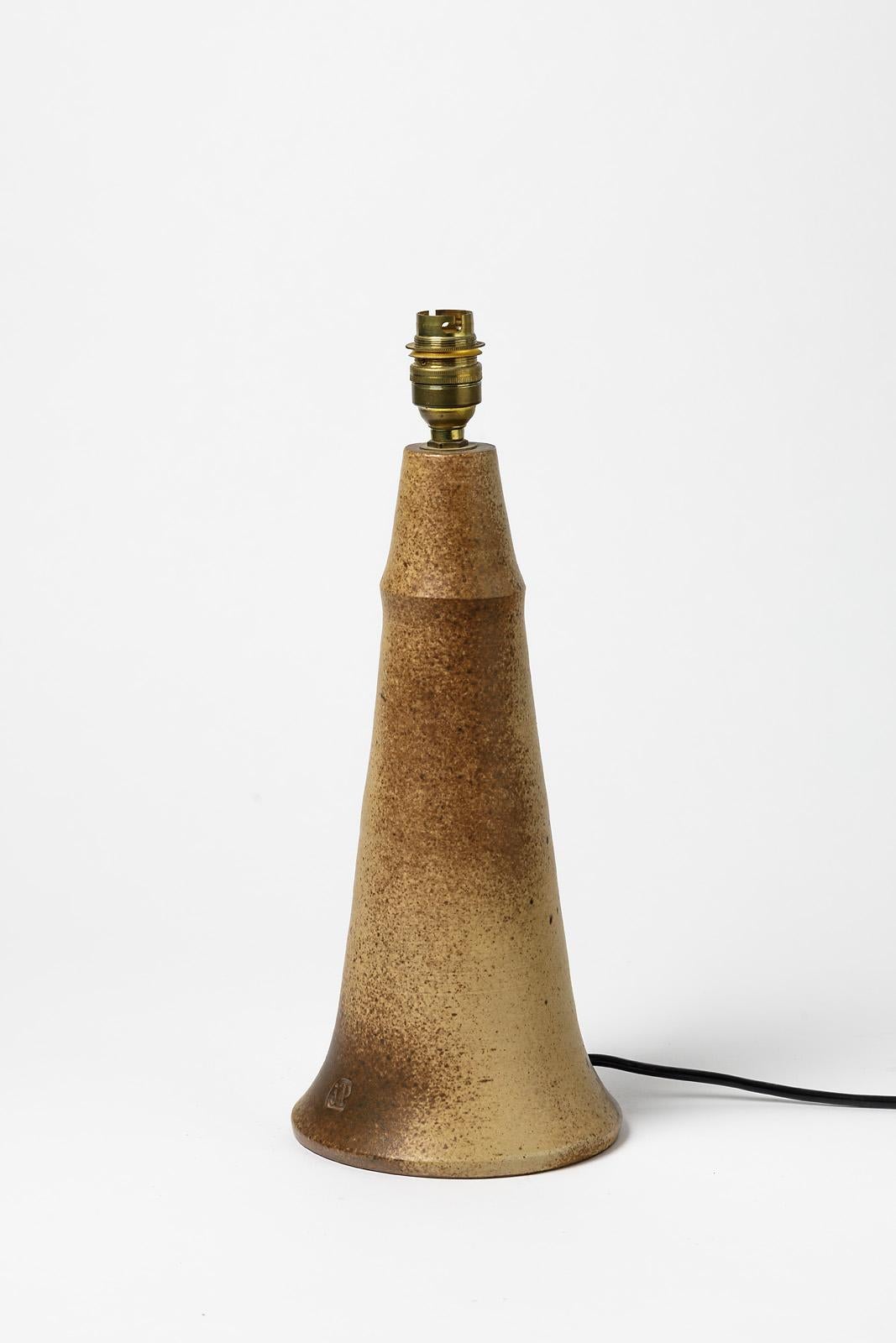 Jean-Jacques Prolongeau

Mid-20th century lighting design ceramic table lamp by the French artist.

Elegant and decorative freeform and brown ceramic color.

Signed at the base

Original perfect conditions

Sold without
