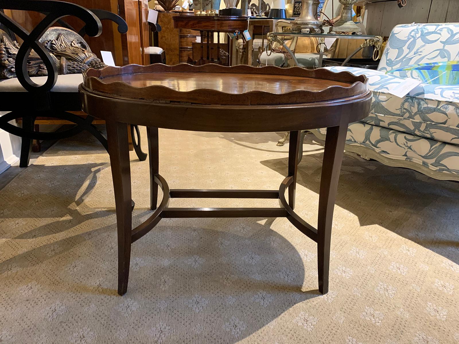 20th century English oval tray coffee table with scalloped edge.
