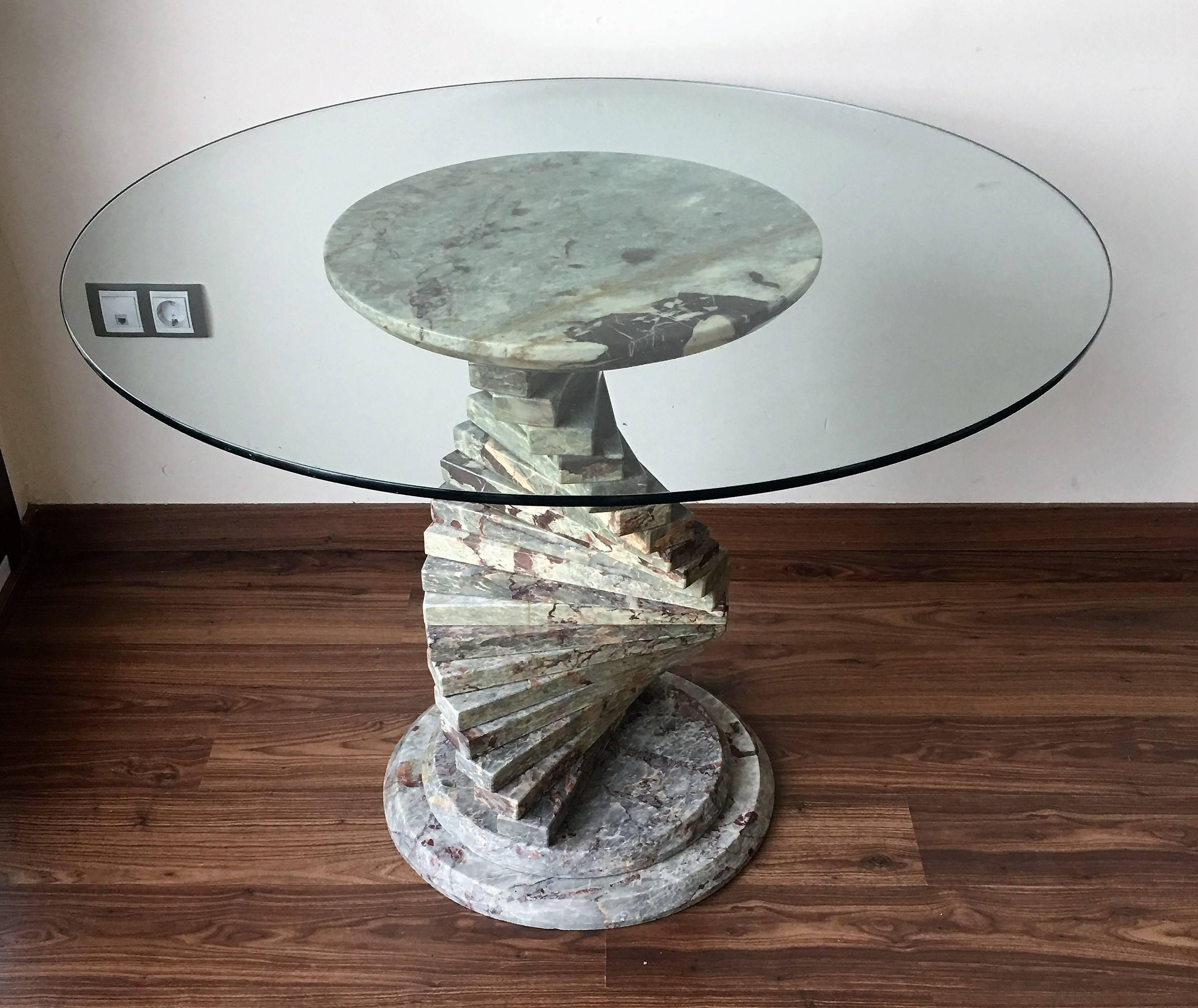 Art Deco pedestal marble dining or coffee table with round glass top

Measurements of each piece: 13.75in x 1.25in
Floor base measurements diameter 19.25in.