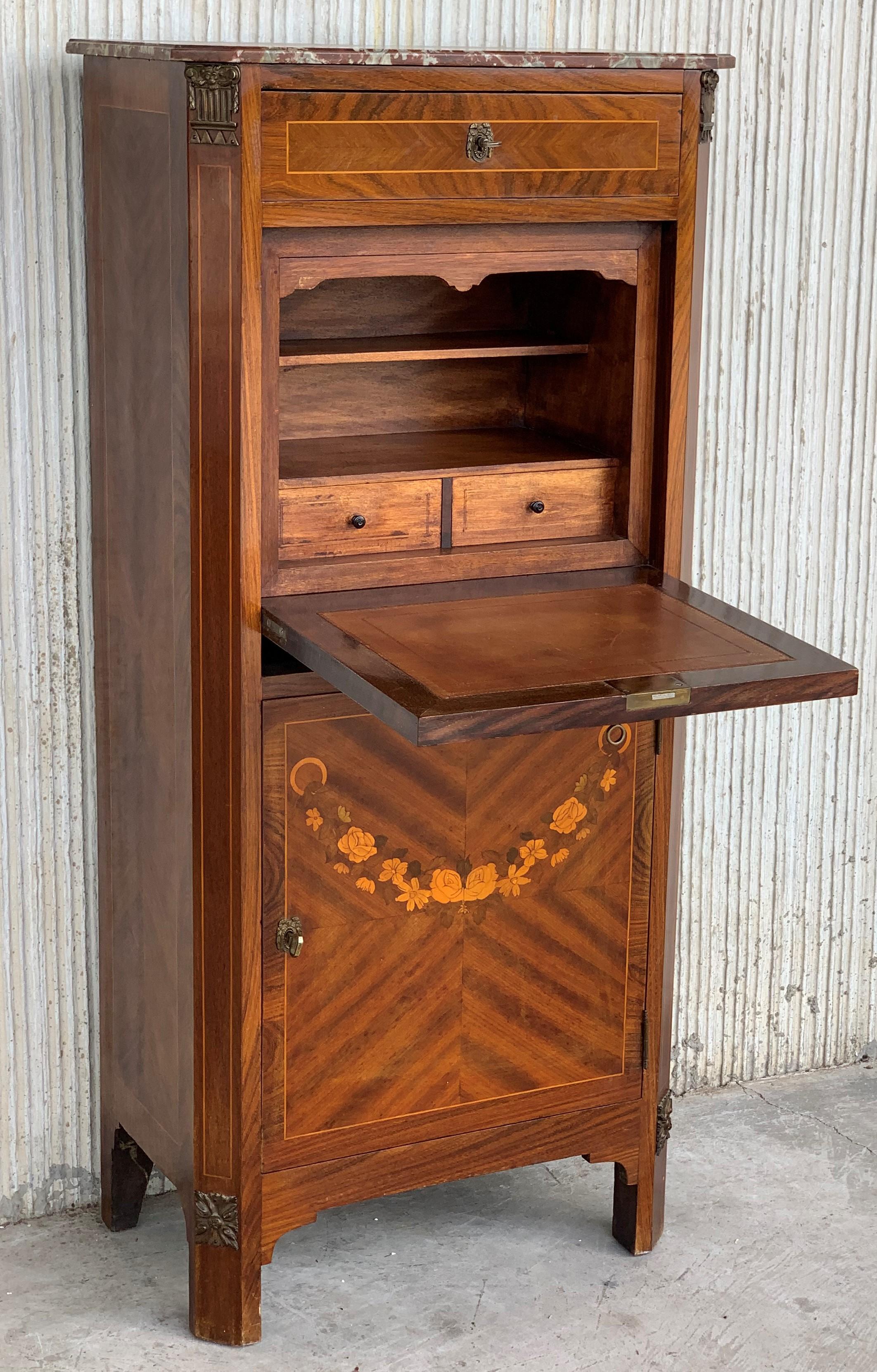 Secretaire a abattant, Spain circa 1900. The outside with fall front and one high drawer and one low door with compartment, beautiful marquetry oakwood . The wood inside opens to a central compartment flanked by two drawers.

Measures: Height to