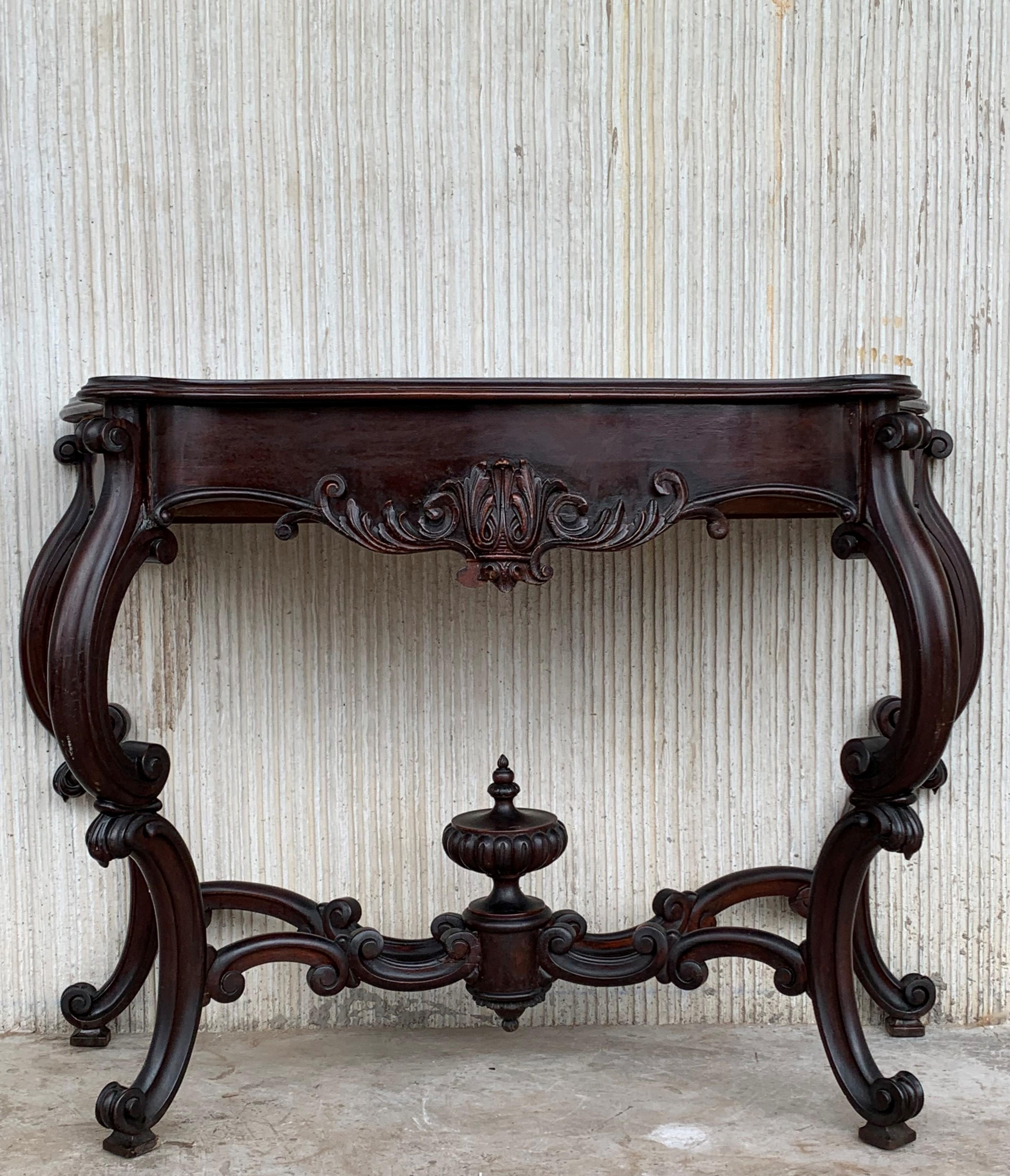 20th century French Regency carved walnut console table with drawer 

20th century French Regence style beautifully carved with leaves walnut console. Wood top with front drawer, over hand-carved frieze supported by four cabriole legs connected by