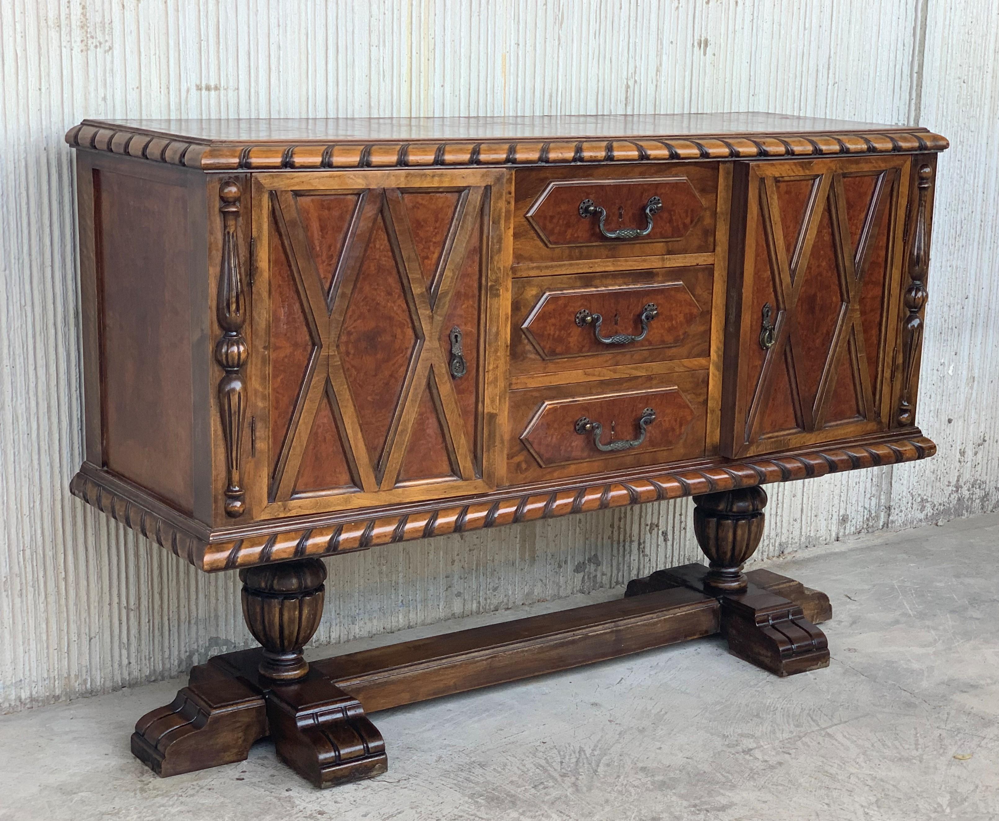 20th century French walnut buffet with two doors and three central drawers.