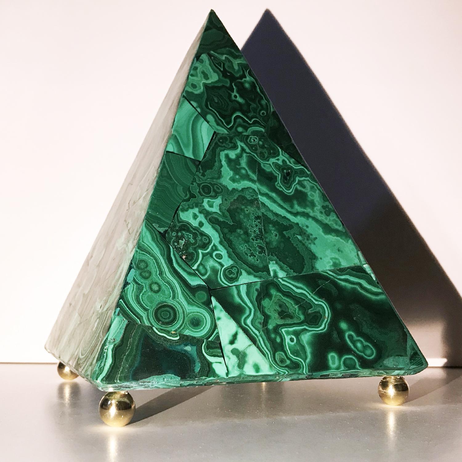 A very beautiful pyramid made with Malachite using the cosmatesque tecnique, made with very thin slab of the very precious Malachite, on a wood base.