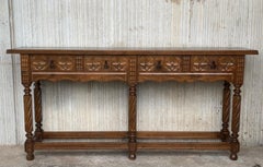 20th Large Carved Four-Drawer Spanish Walnut Console Table with Iron Hardware