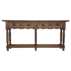 20th Large Carved Four-Drawer Spanish Walnut Console Table with Iron Hardware