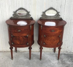 20th Louis XVI Style Marquetry Nightstands with Metal and Mirror Crest. A pair