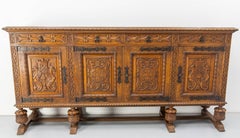 Aparador español de mediados del siglo XX Cuatro cajones y puertas Roble y hierro forjado martillado