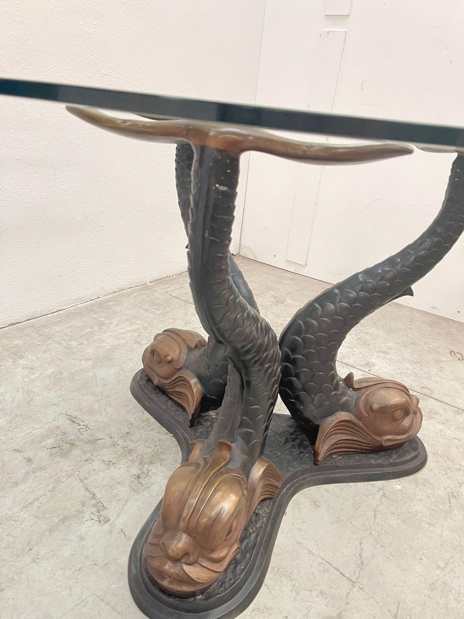 Modern table made in Italy. The upper part is made of glass resting on worked brass which depicts 3 animals made in the smallest detail. castello di nelson famous vetro tavolo.

Replica de Mice Versailles.