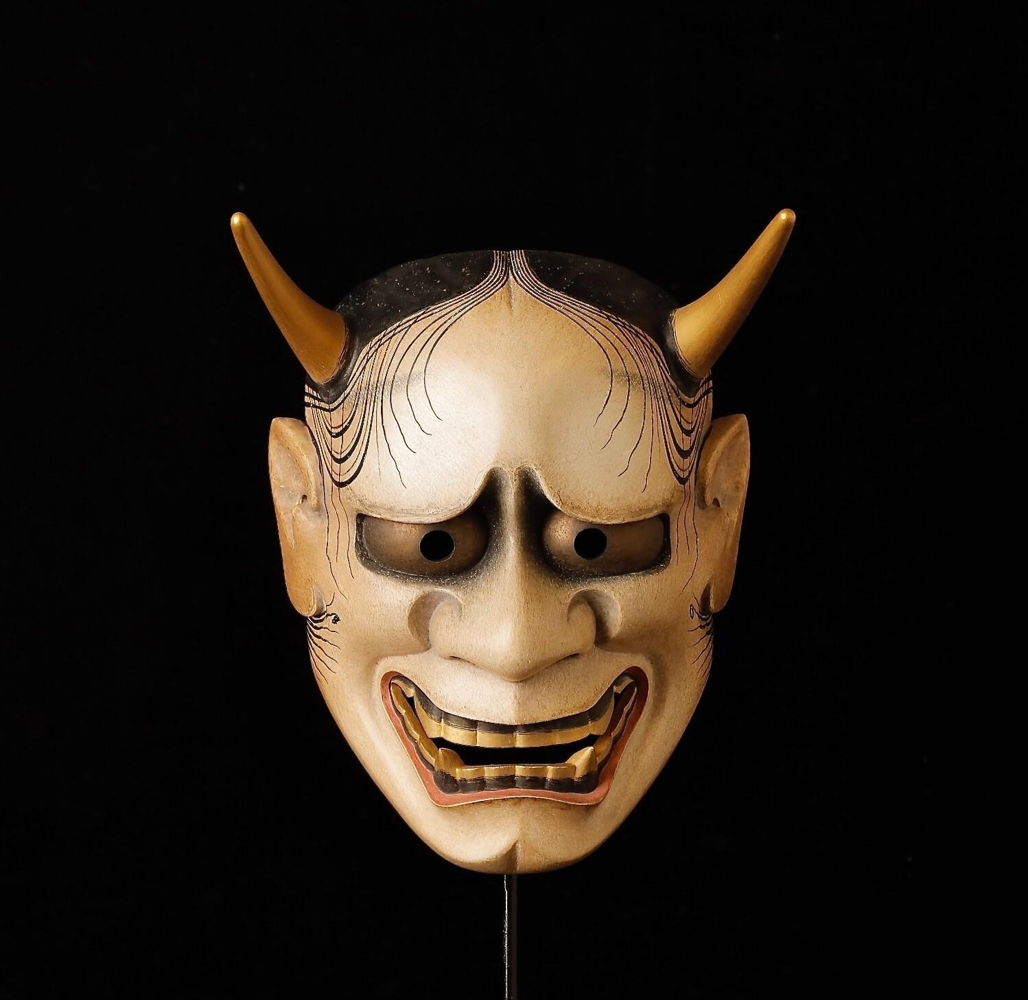Superb Noh Mask Depicting Hanya Character representing jealous female demon. Signed by Kagei Nobuharu. Mask includes original textile bag.
Noh masks are a centuries-old art form that is essential to the performance of Noh theater. They are carved