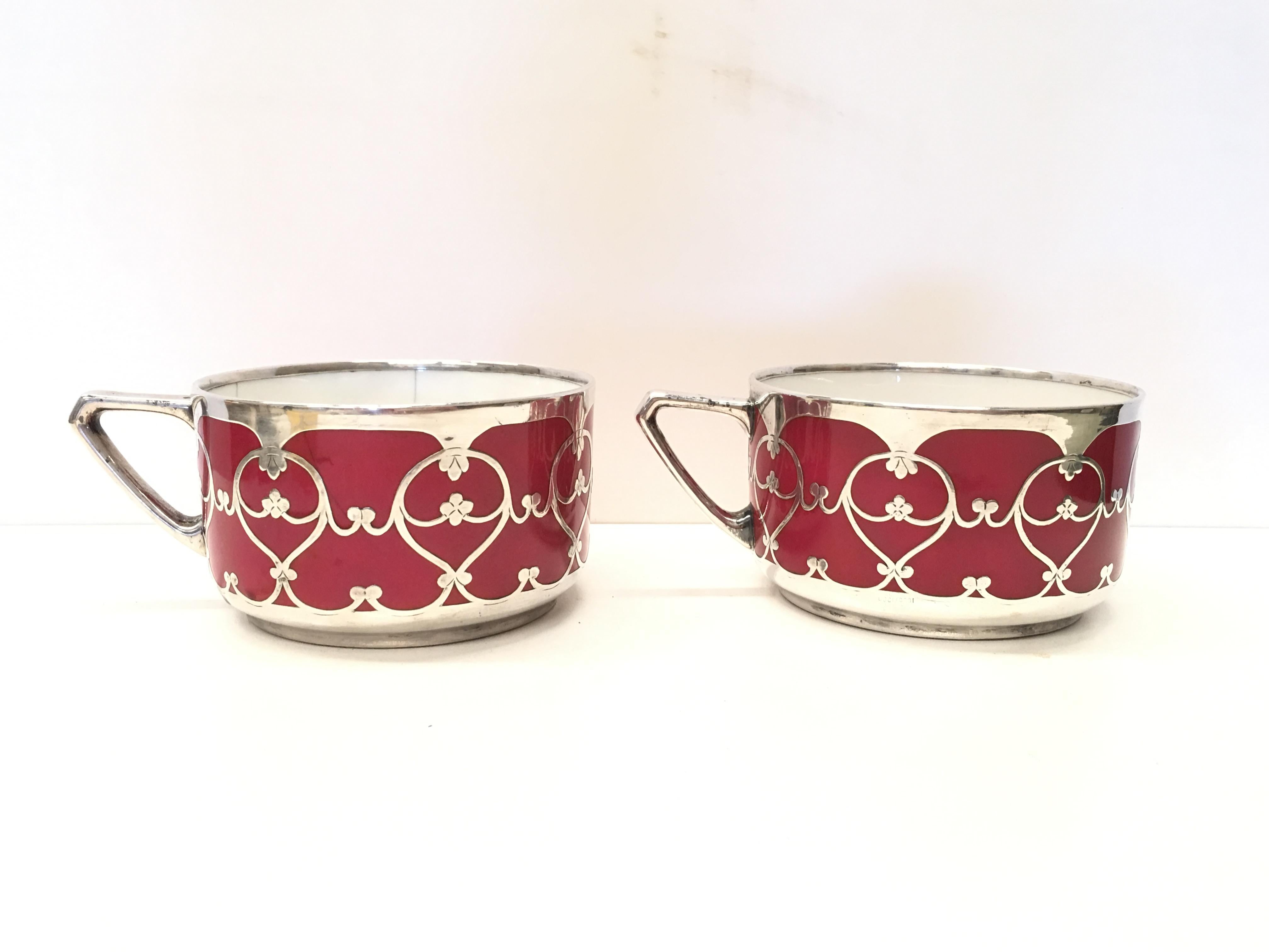 20th pair of Hutschenreuther handled Art Decó small porcelain cups decorated in silver.