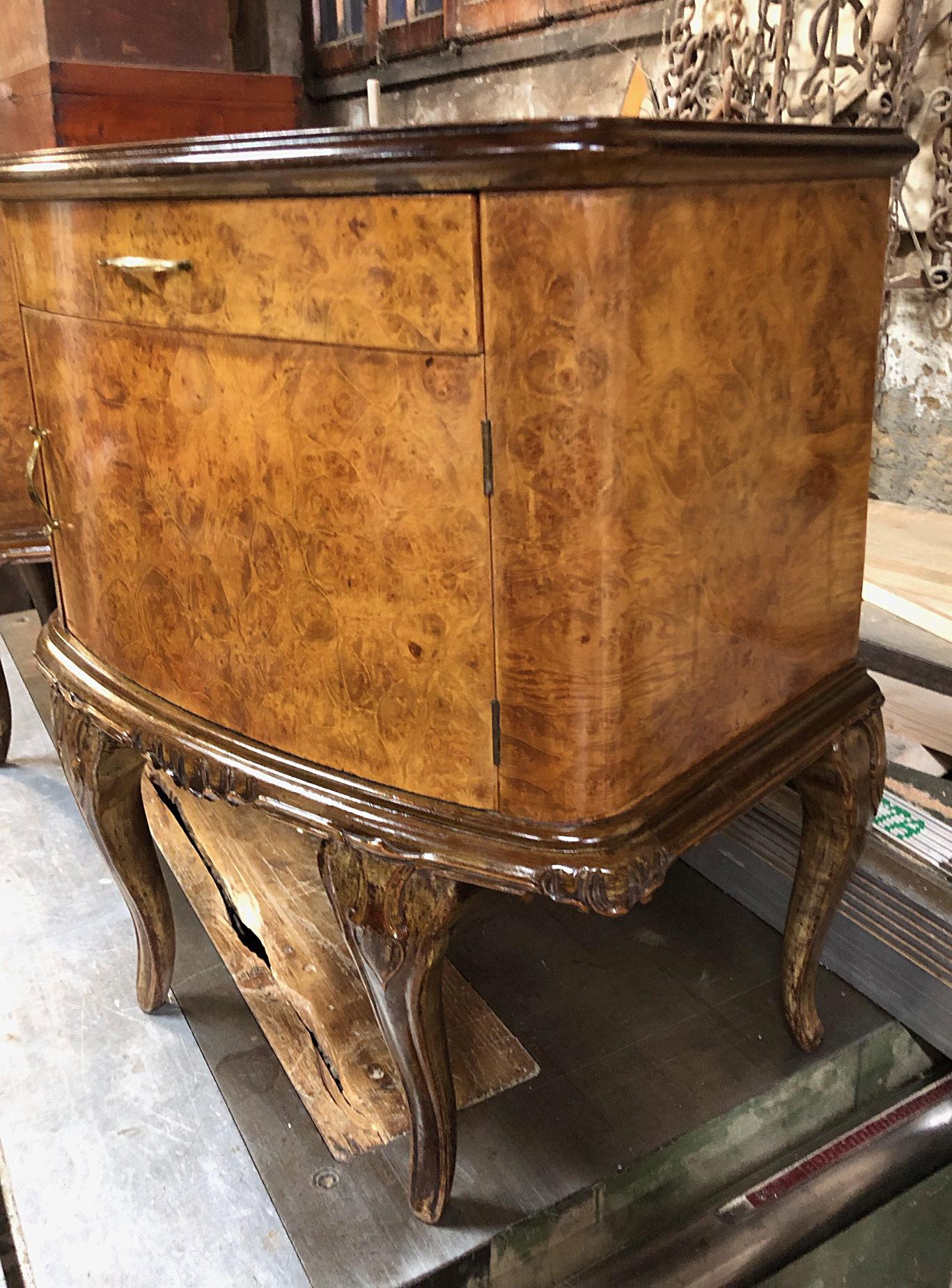 Pair of Italian night stands dating back to the mid-1900s. 
The coloring is original in patinain and wood maple burl with pink glass top.
Original color and handles.
They have a drawer at the top and snap-lock doors.
Comes from an old elegant