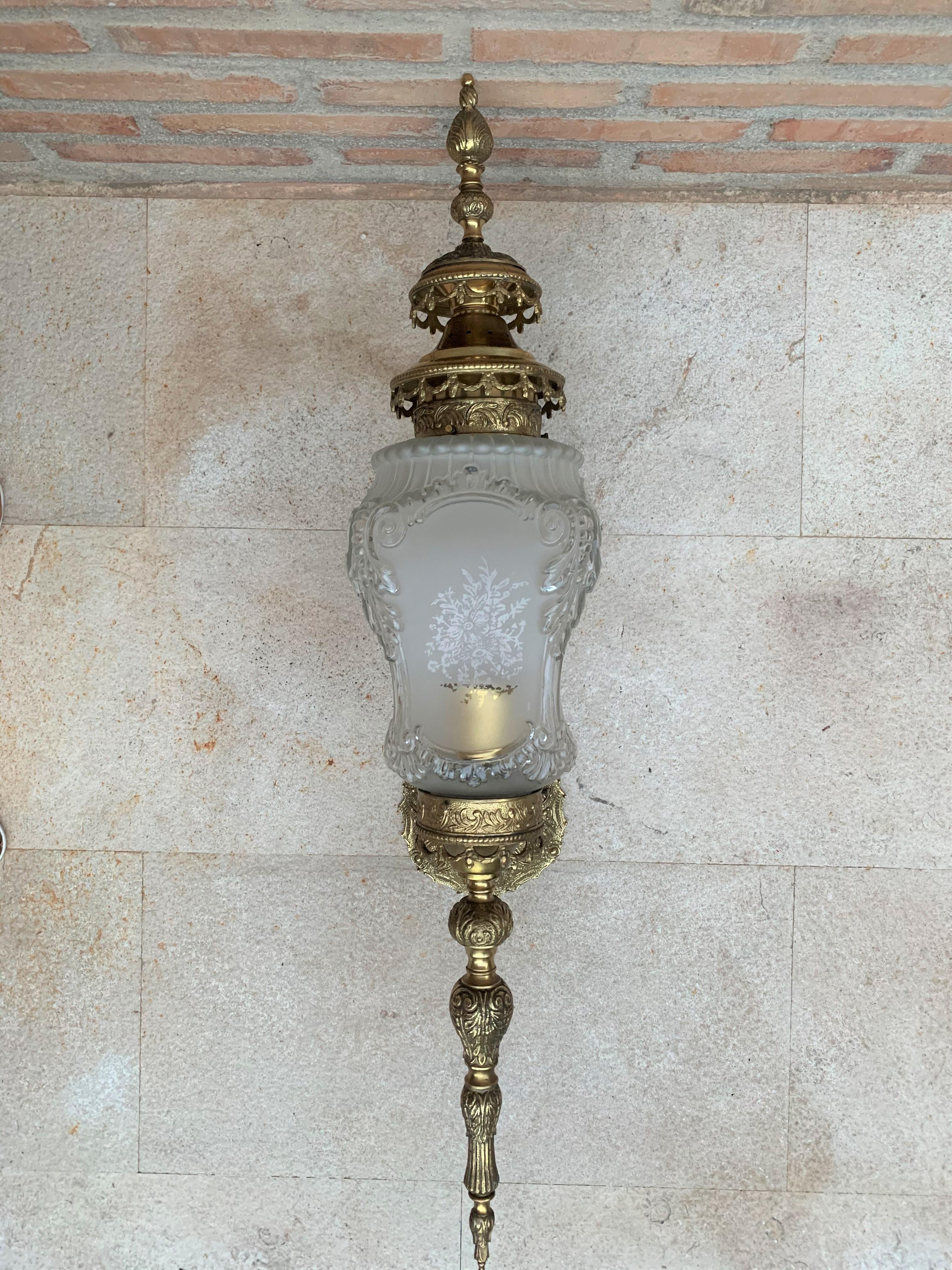 20th century pair of large French bronze and glass sconces.