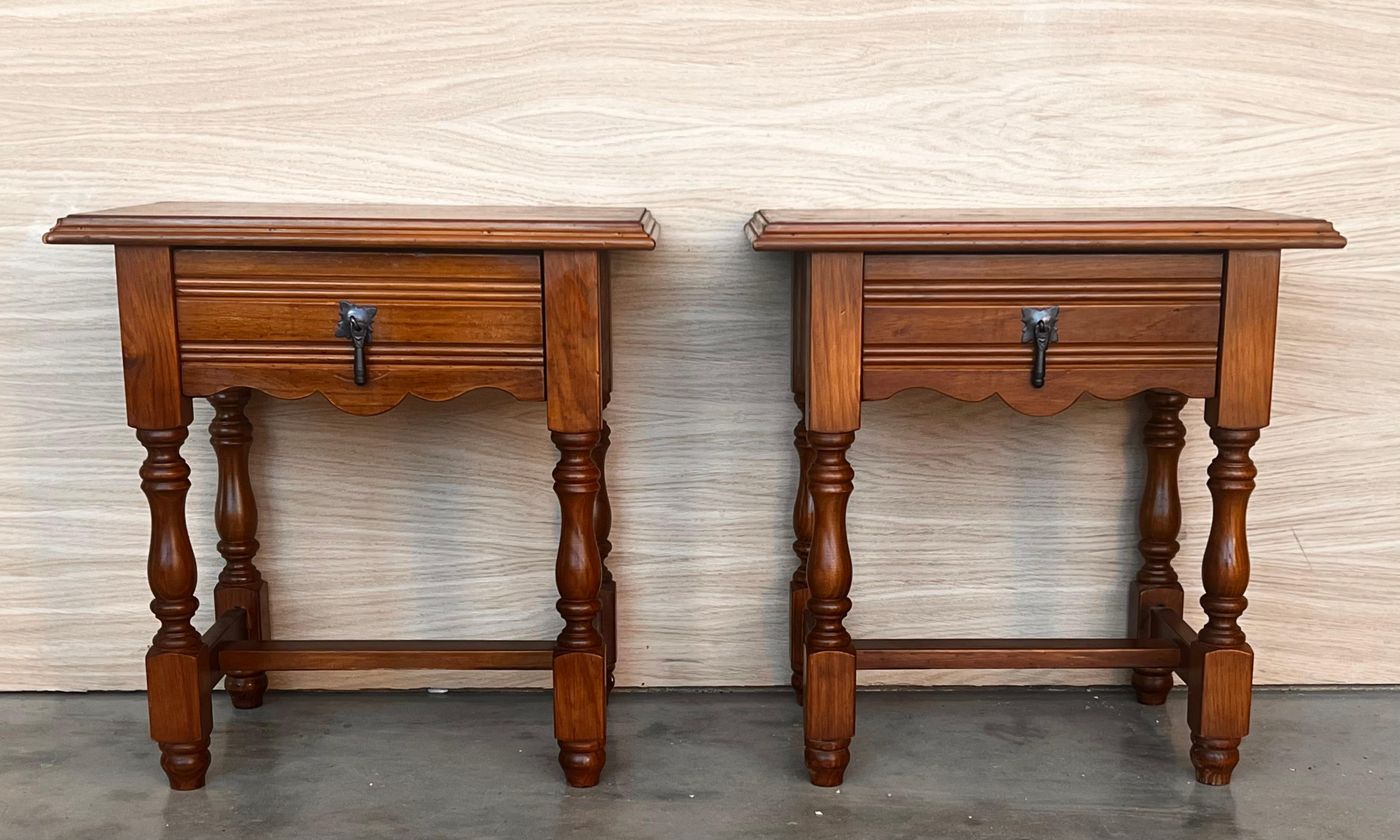 20th century Pair of Spanish nightstands with one drawer . The table has beautiful carved drawers with original color contrast. Beautiful tables that you can use like a nightstands or side tables, end tables or table lamp, desk or console.