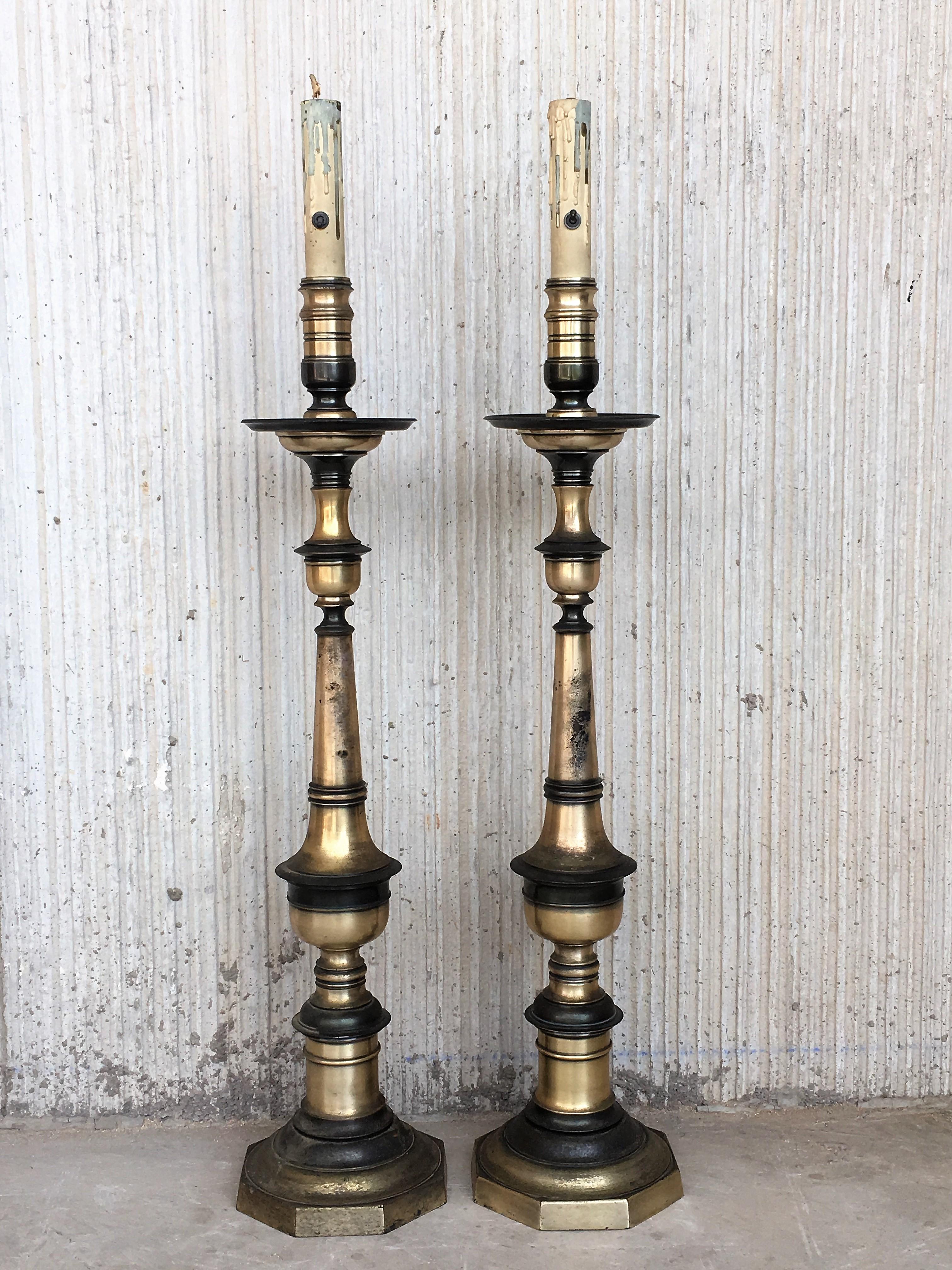 Pair of Renaissance style bronze pricket lamps.
These large pricket lamps provide the perfect balance for rooms with large-scale and impact.
Newly wired.