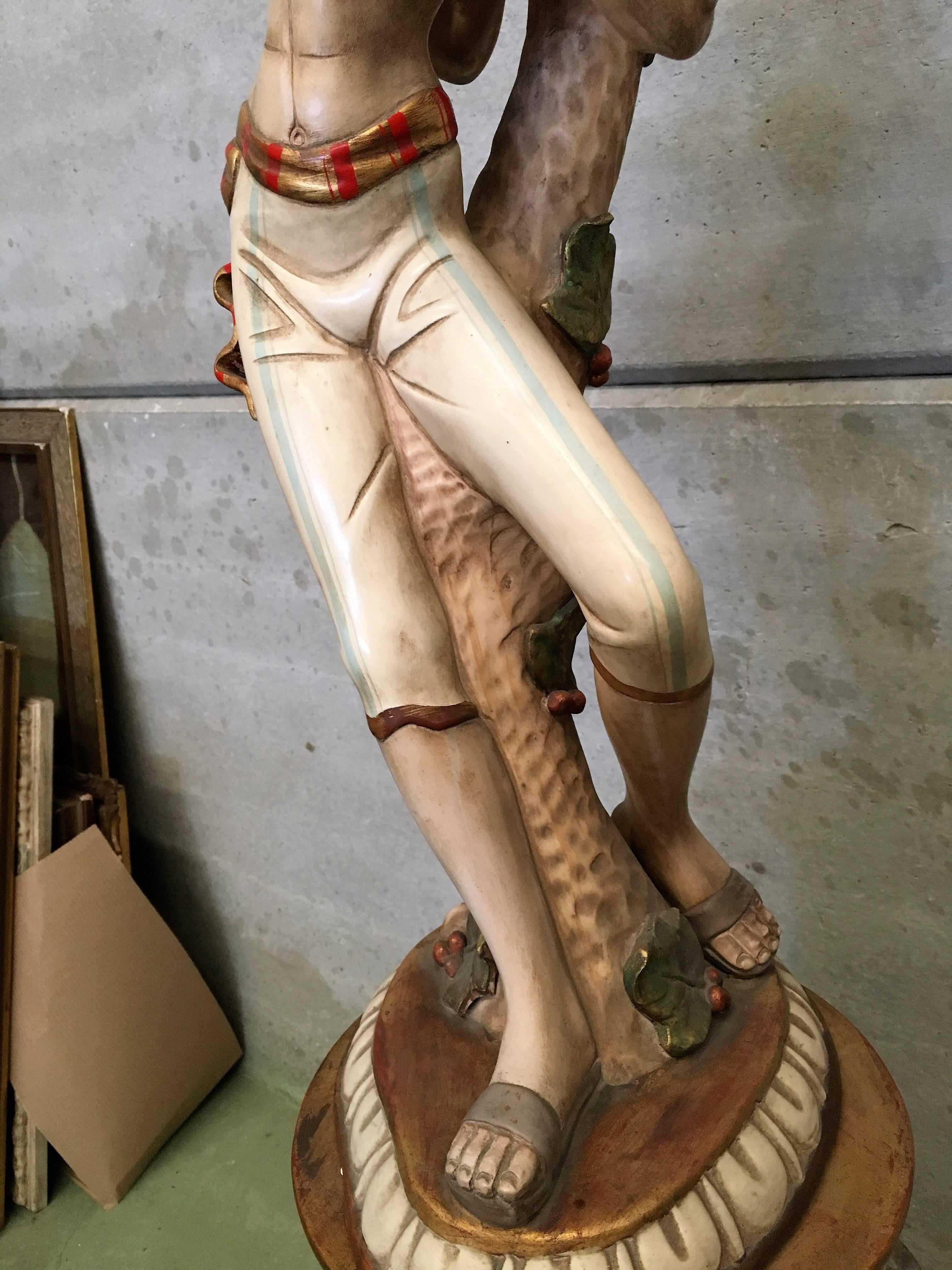 20th Sculpture of an Asiatic Man with Birds and Harlequin Motifs, Spain In Excellent Condition For Sale In Miami, FL