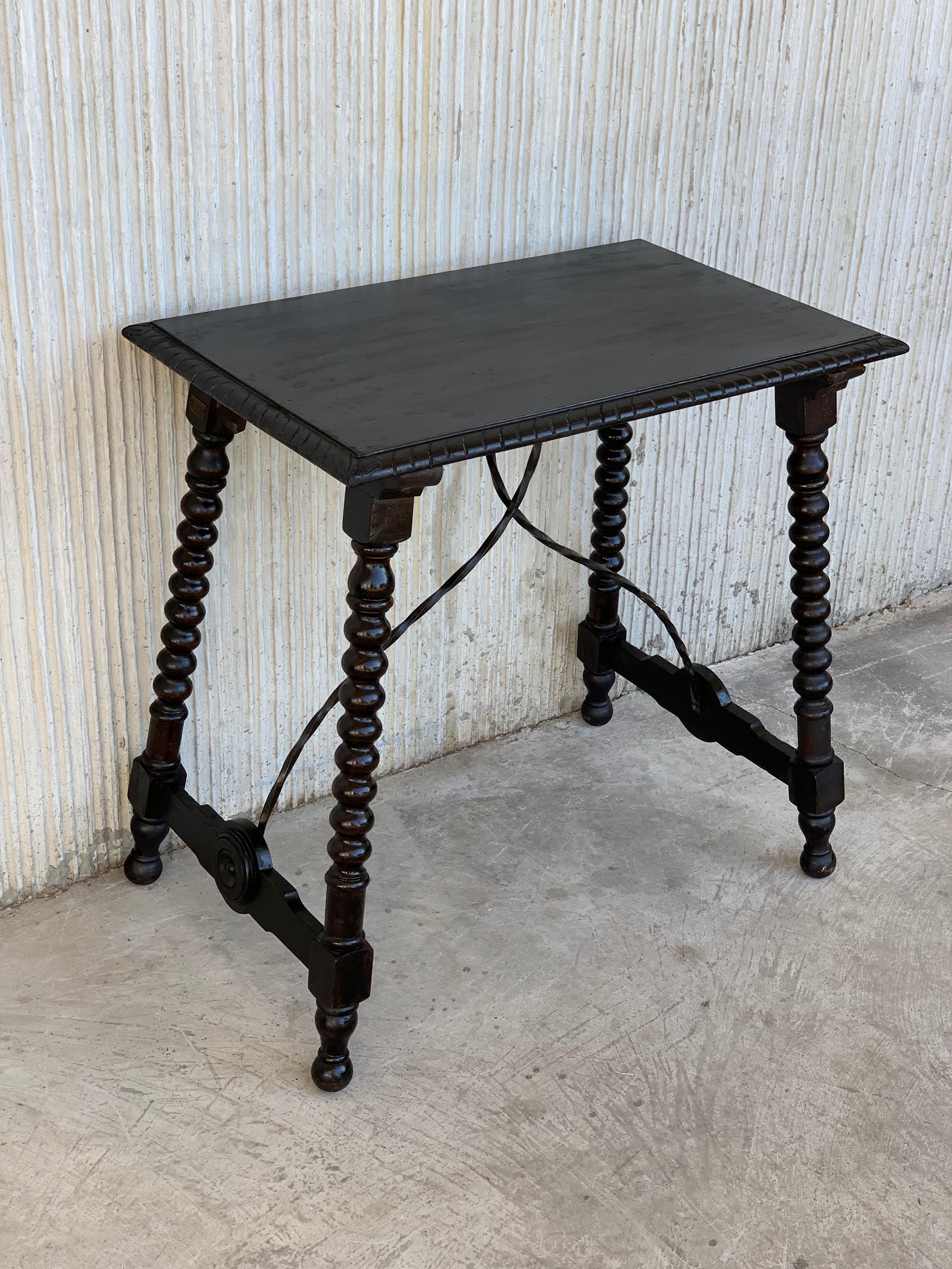 Spanish Baroque Side Table with Iron Stretcher and Carved Top in Walnut In Good Condition In Miami, FL