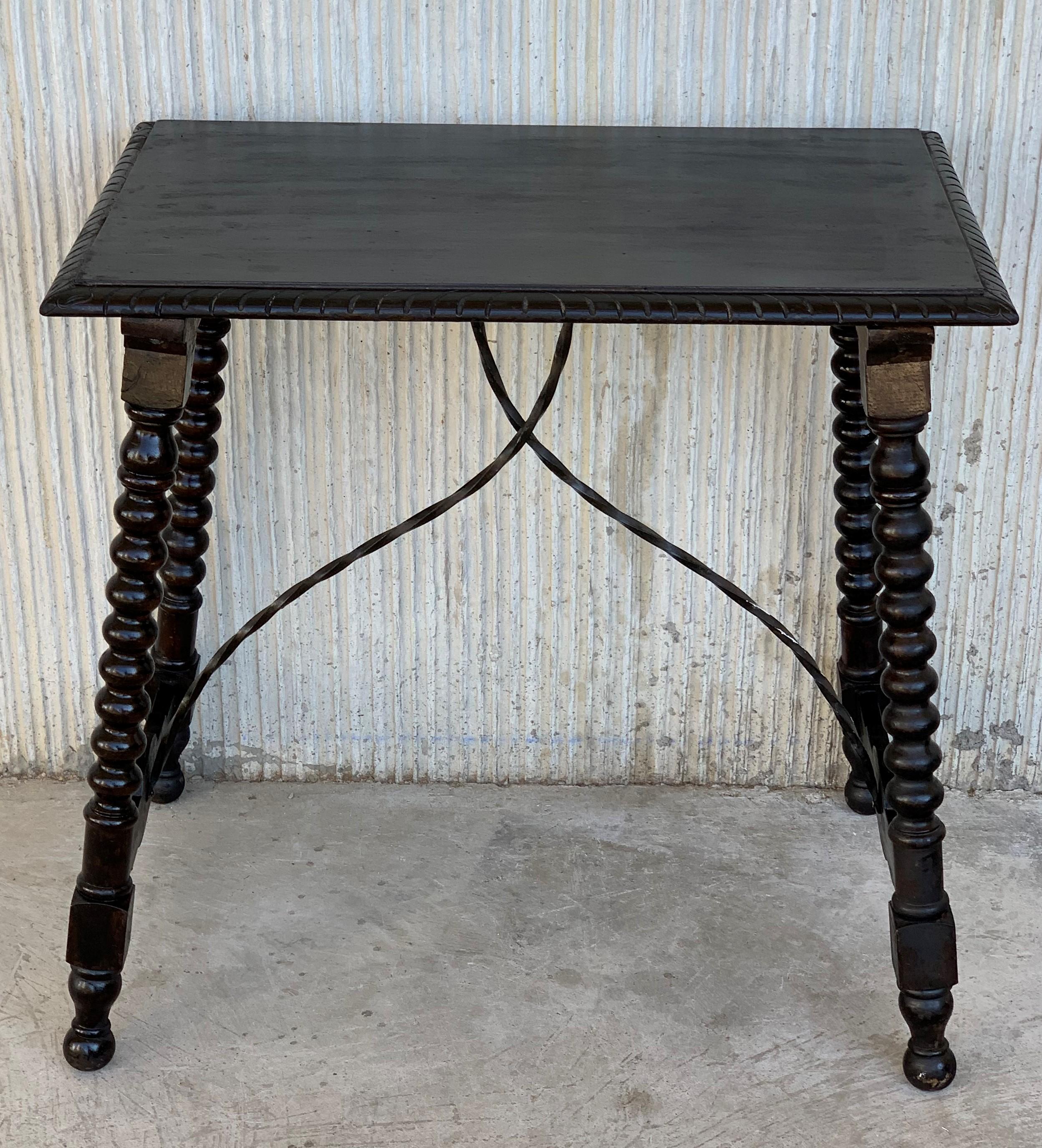 20th Century Spanish Baroque Side Table with Iron Stretcher and Carved Top in Walnut