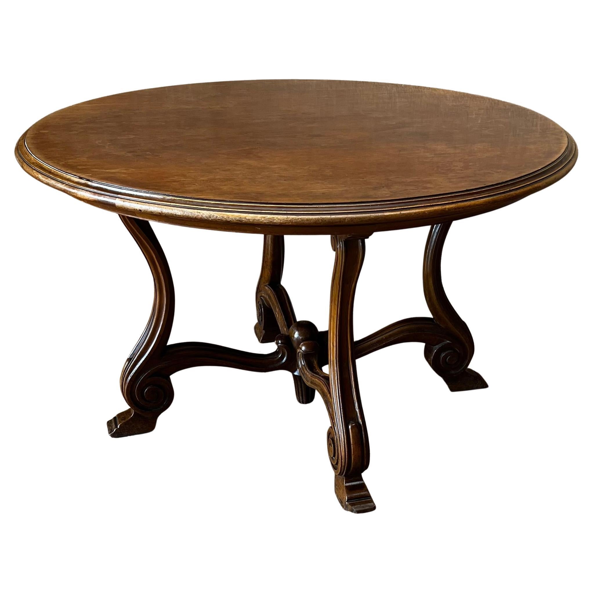 20th Spanish Round Coffee Table with Four Carved Legs and Stretcher