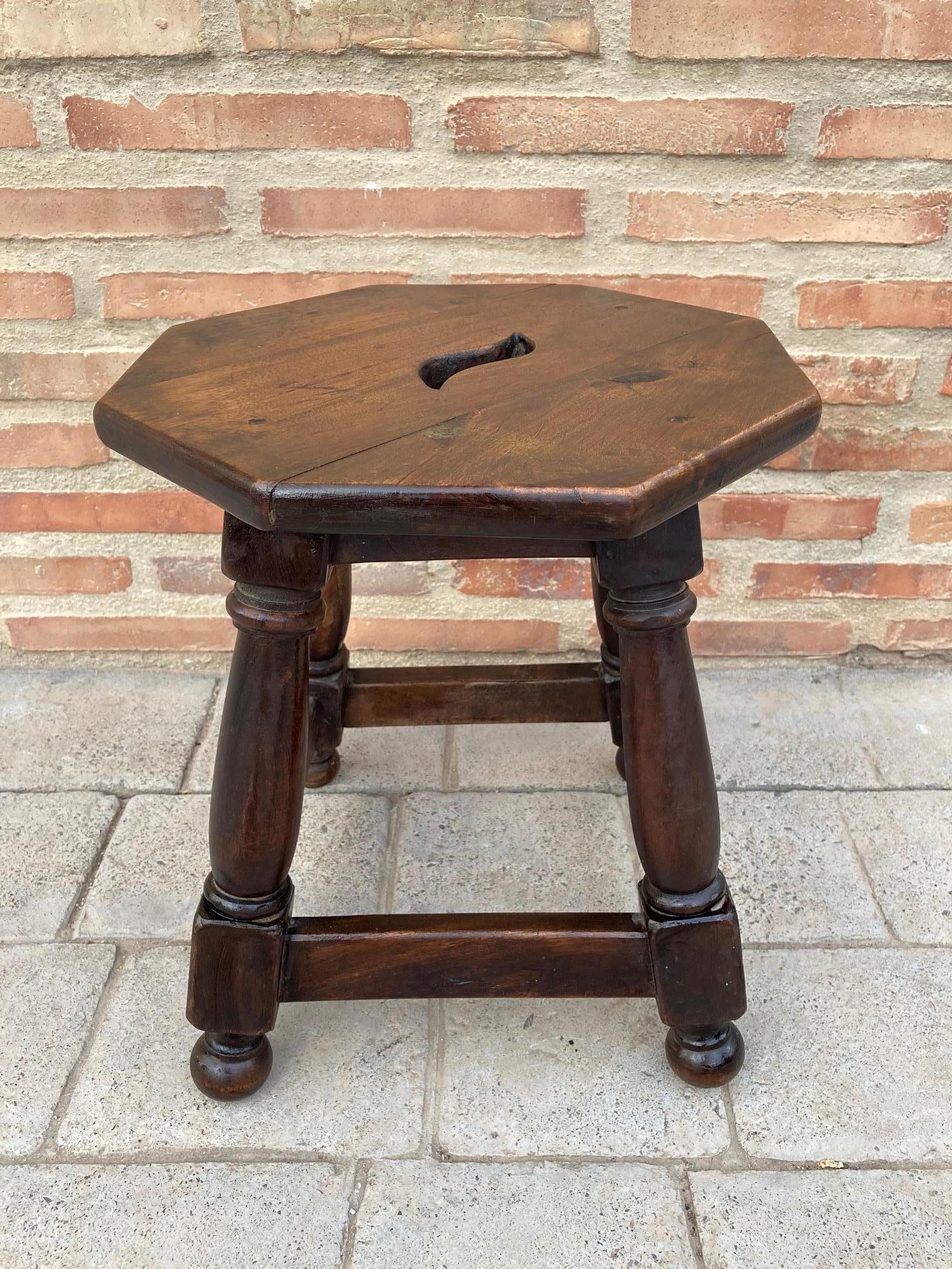 20th century Spanish rustic low stool or low table with octagonal top.