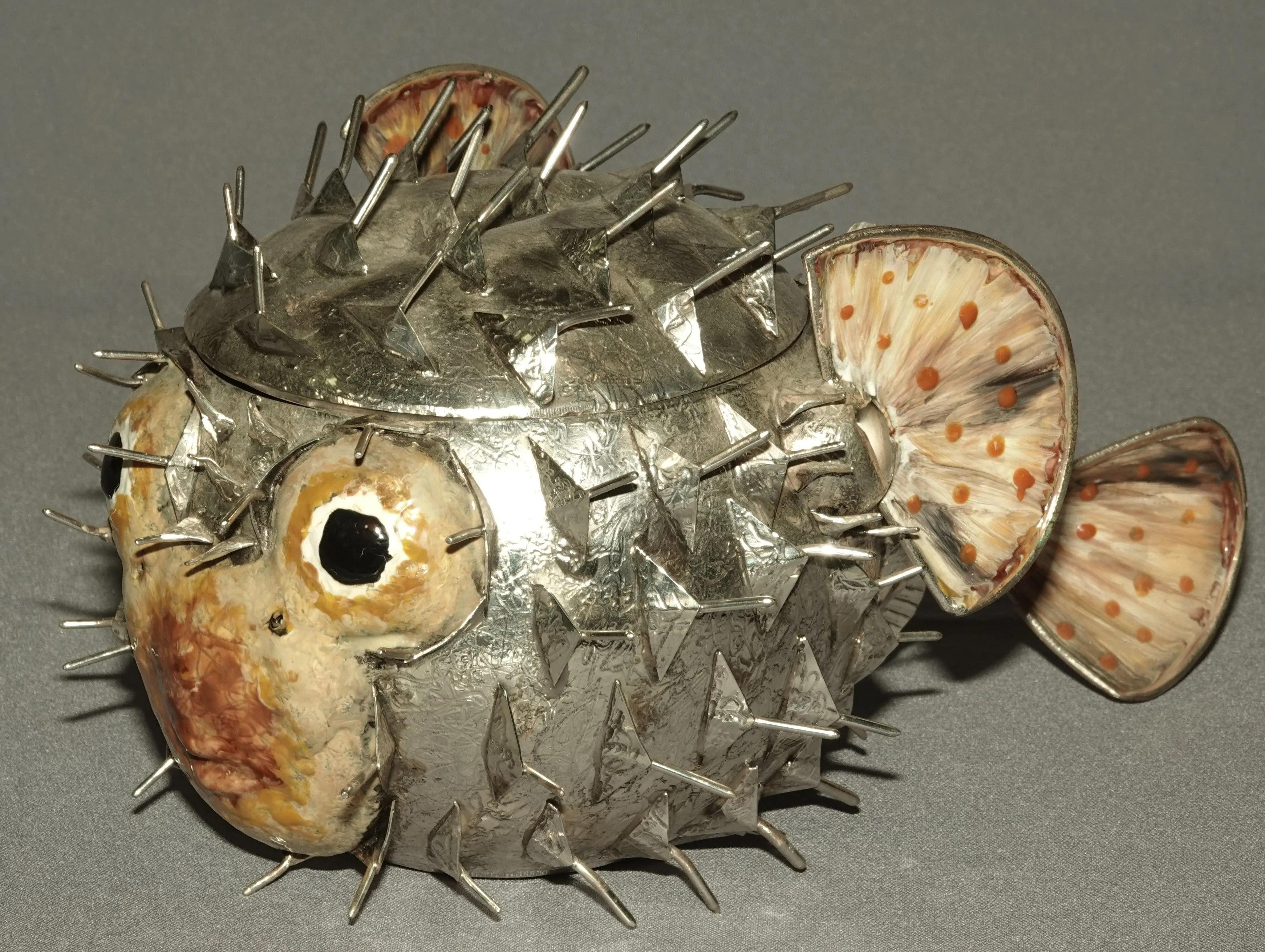 Rare 20th italian Sterling Silver caviar dish / bowl

In the shape of a puffer fish with enamel, with a glass bowl

Hallmark 925

Measures: Weight without glass: 1072 grams 
Height 15 cm - 5.9 inches
Length: 29 cm - 11.4 inches
cm