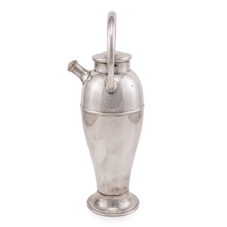 A large “milk churn“ shaped cocktail shaker made in the USA, produced in the 1940s. Just as the prohibition era was lifted in 1933, it is easy to imagine the appeal behind these objects which would have made wonderful items to wow their guests. As