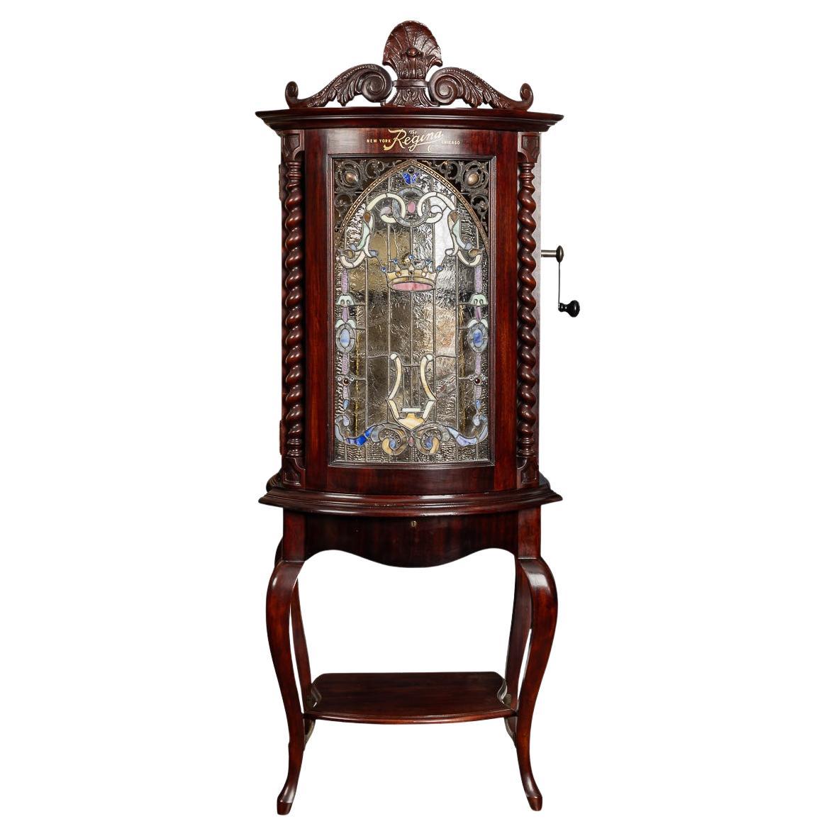 Scatola americana del XX secolo "The Regina Music Box Co." a 12 dischi per la riproduzione automatica della musica, c1900