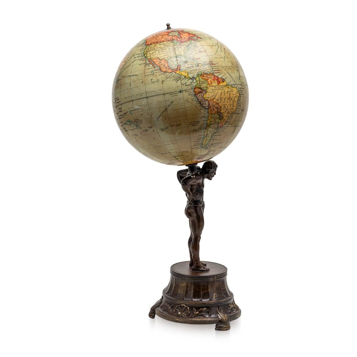 Britannique Globe géographique britannique du 20e siècle dirigé par une statue d'Atlas en bronze, vers 1920 en vente