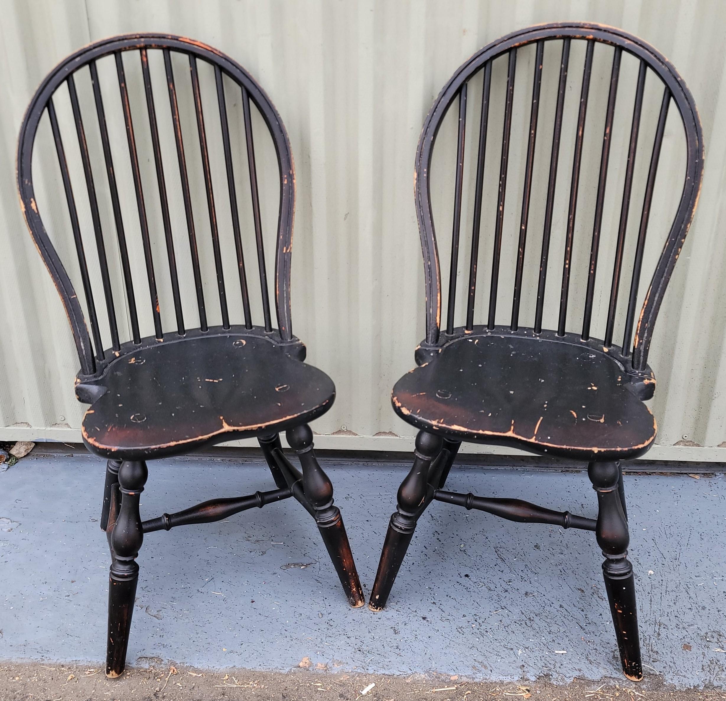 Early 20Thc Original black painted bow back Child's Windsor chairs in fine condition. These fun Children's Windsor chairs are so unusual and hard to find.