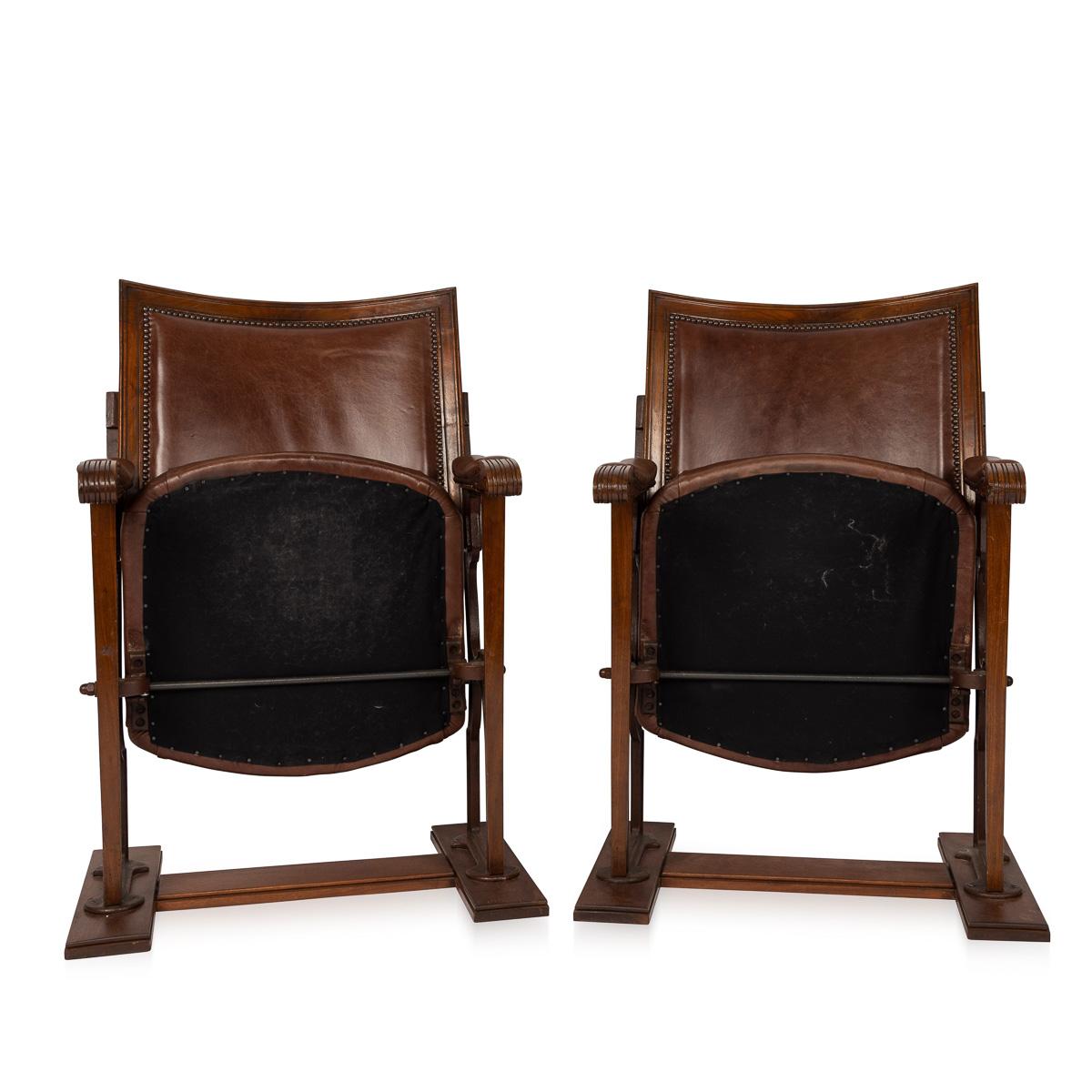 Antique 20th century Edwardian mahogany cinema / theatre chairs, on steel legs with mahogany frames and hand coloured leather seat and backs. Fantastic look for any interior, both modern and traditional.

Measures: Height 98cm
Seat height