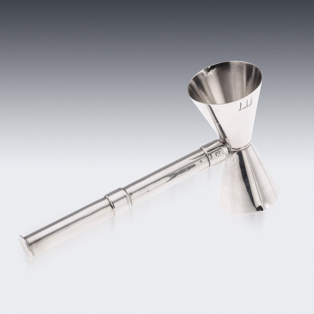 A striking mid-20th-century English Art Deco silver-plated drink measure, corkscrew, and bottle opener by Dunhill. Designed to resemble a hammer, it features two alcohol measure sizes incorporated into the hammer, the handle houses two detachable