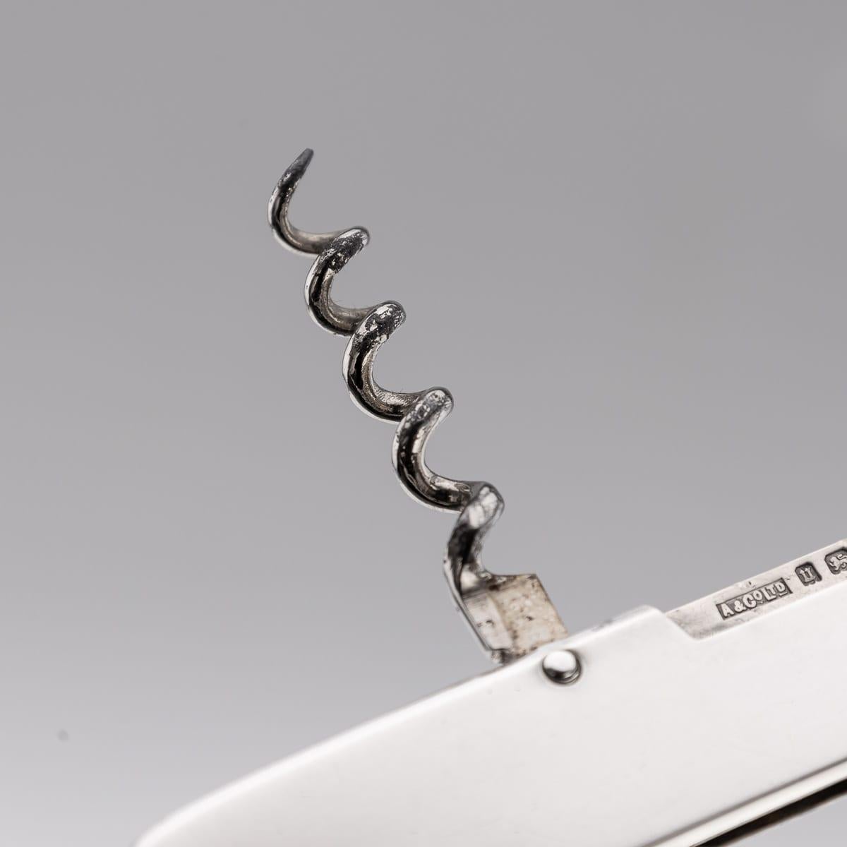 A.I.C C. en argent massif du 20ème siècle, outil de combinaison 