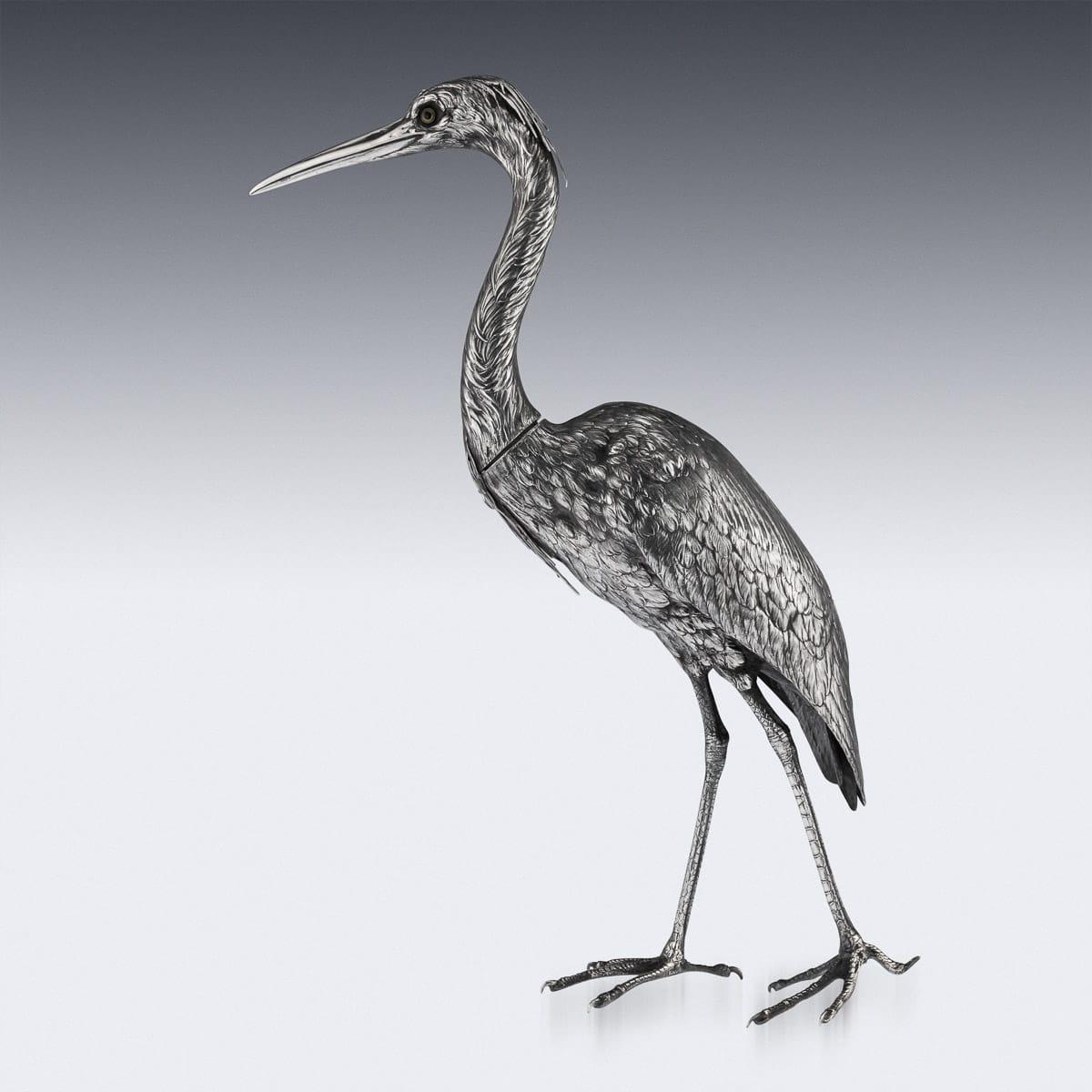 Antique early 20th century German Hanau solid silver figure modelled as a standing stork. The statue is stunningly well-refined and realistically modelled in every small detail, it stands on long legs, has a detachable head and set with realistic