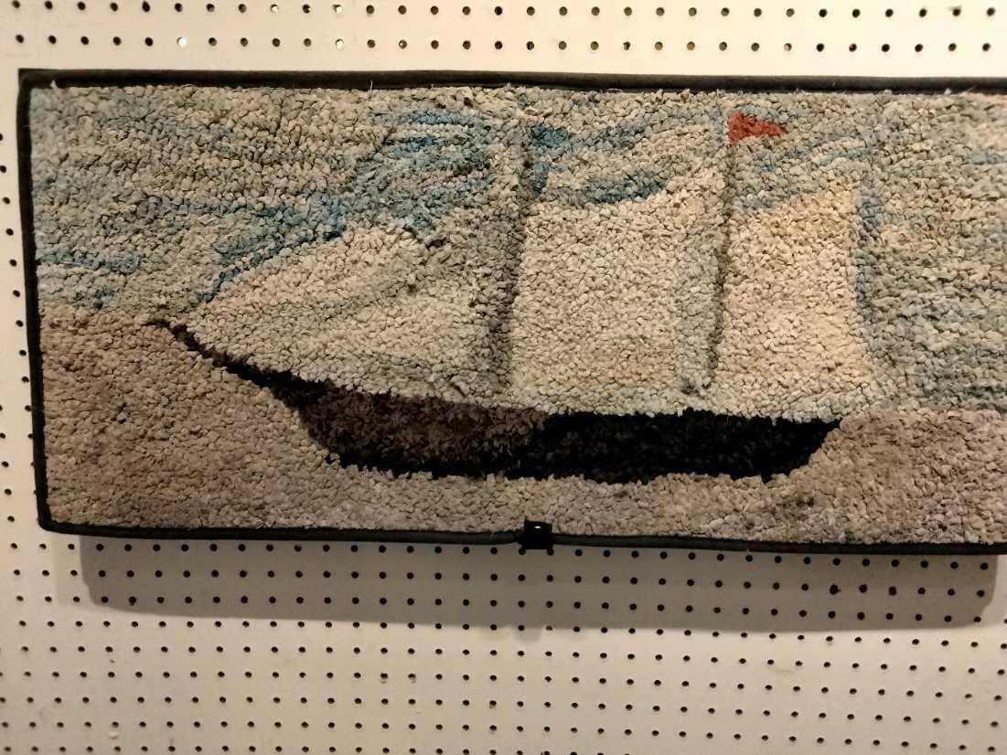 Early 20thc hand hooked sailboat mounted  rug in fine condition and professionally mounted & framed.This was found in New England.