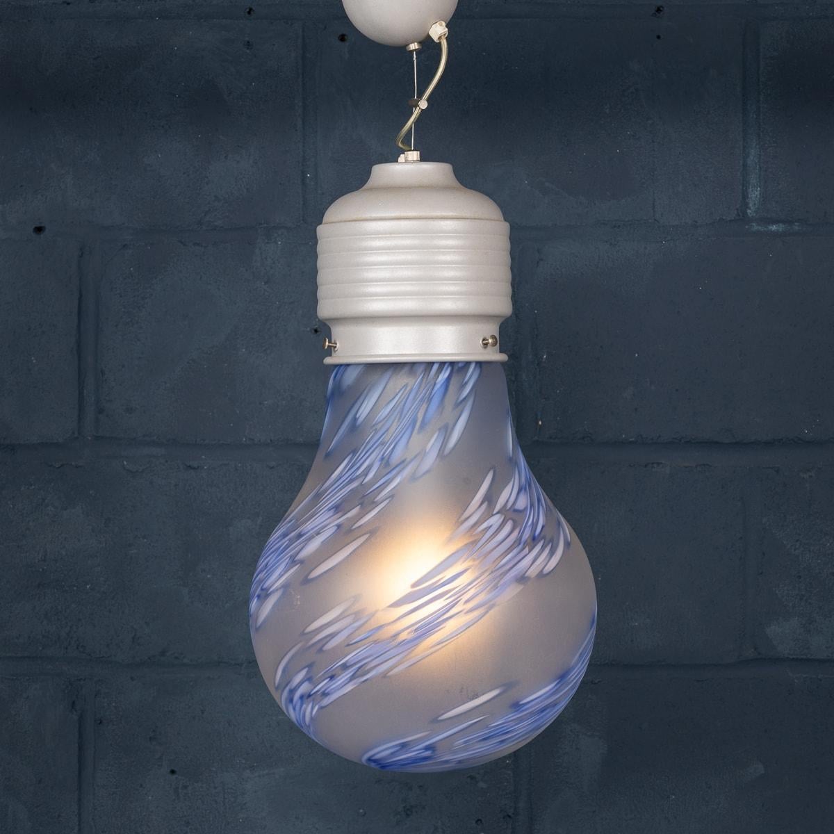 A unique 20th Century ceiling light, designed in the form of a light bulb. The hand-blown glass features a smooth satin finish that softly diffuses light, creating a warm and inviting ambiance. Its mottled blue decoration adds a vibrant hue that