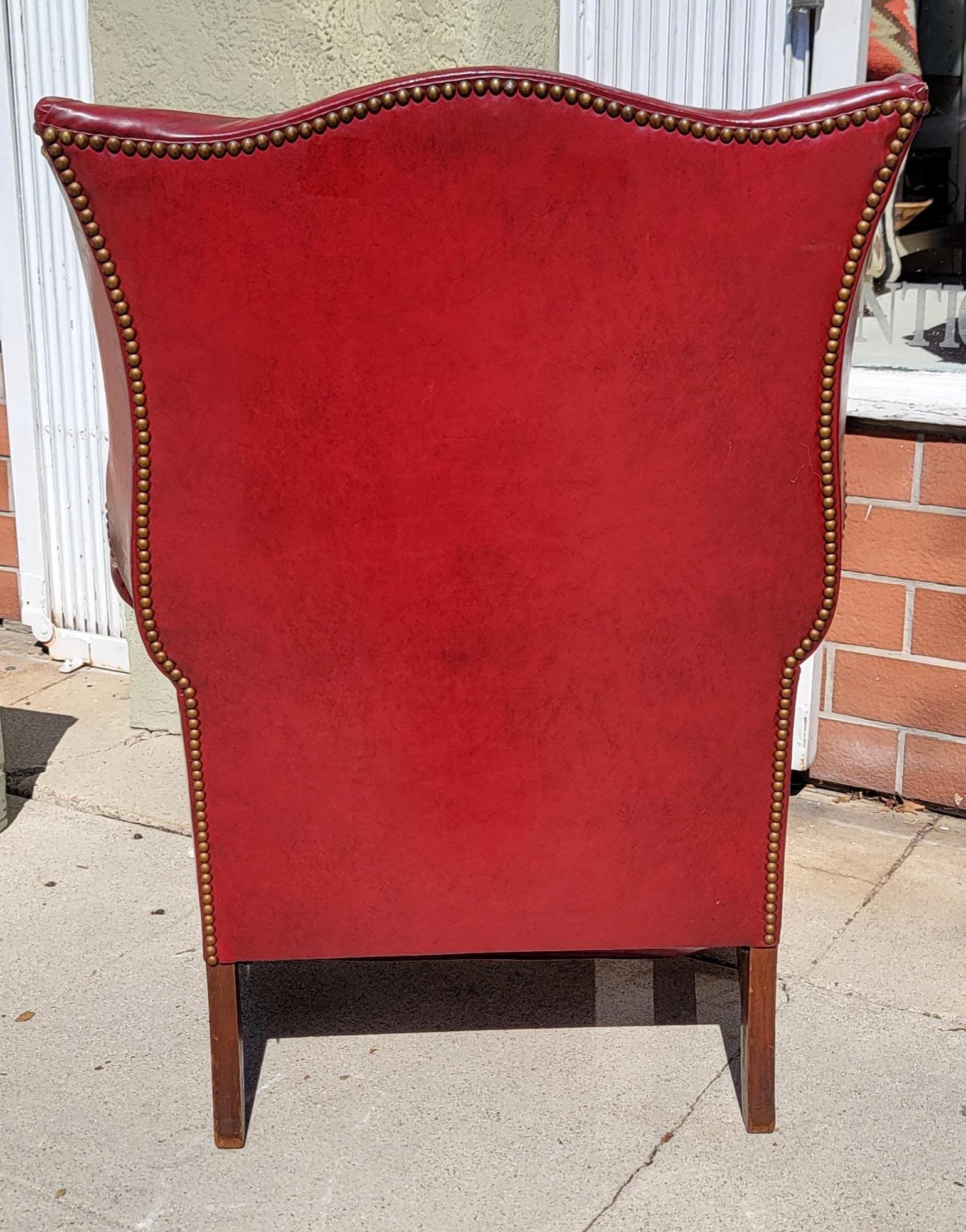 20Thc Red leather wing chair in amazing condition and super comforter.The comforter.