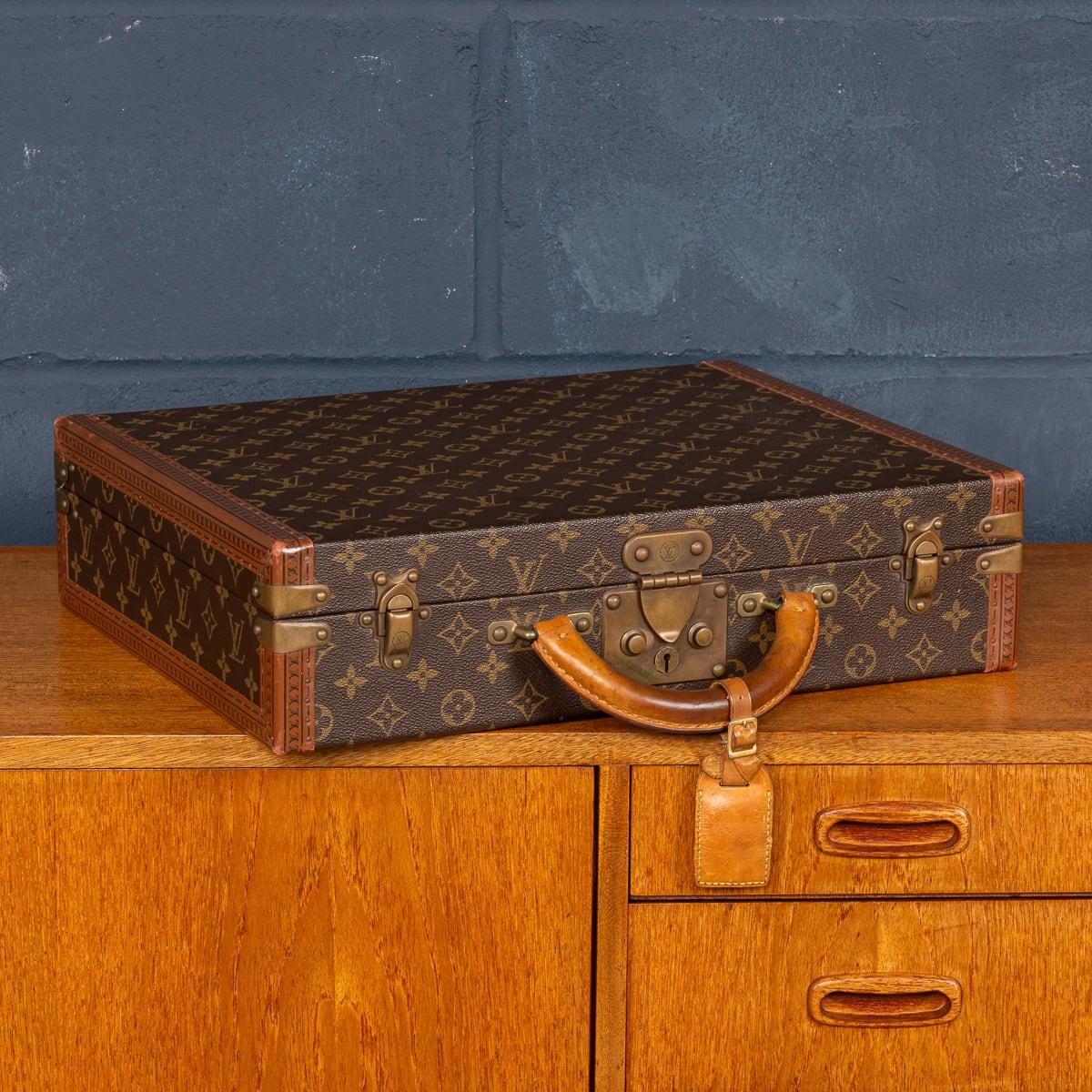 A charming Louis Vuitton hard-sided case, late 20th century, the exterior finished in the famous monogram canvas with brass fittings. This beautiful example is in great condition, all of its brassware working as new. A wonderful and useful item that