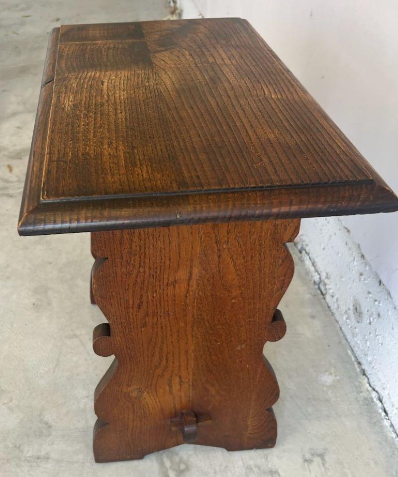 This early 20th century oak Mission side table is in fine condition and is very sturdy. Notice the sides or ends or all mortised together.